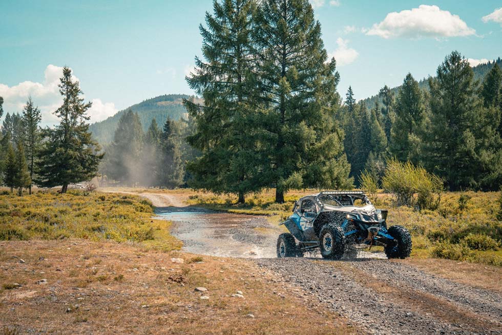 An off-road vehicle in a forest.