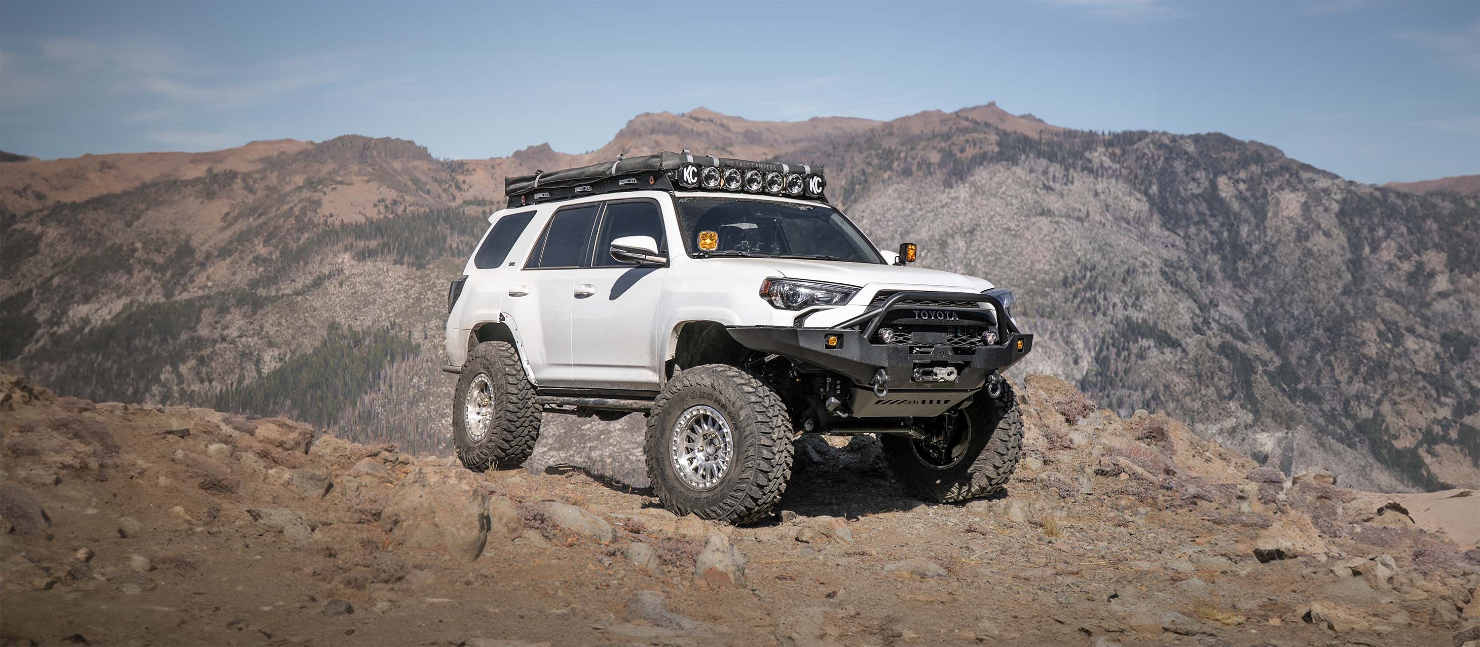 Toyota 4Runner with Backwoods Adventure Mods Off-Road Accessories installed driving off road in the mountains
