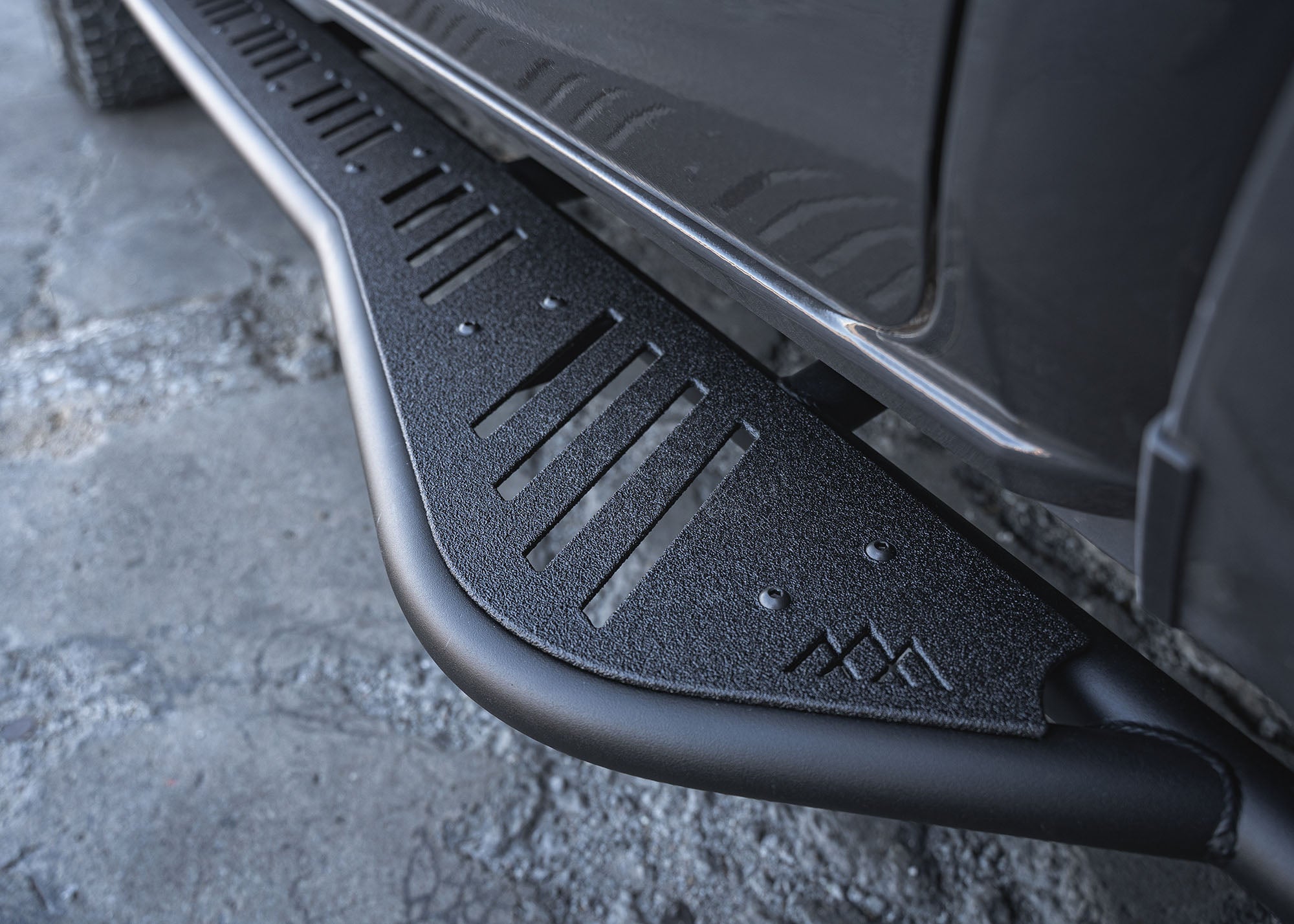 Close up of the finish on the 2024+ Toyota Tacoma Rock Sliders from Backwoods Adventure Mods