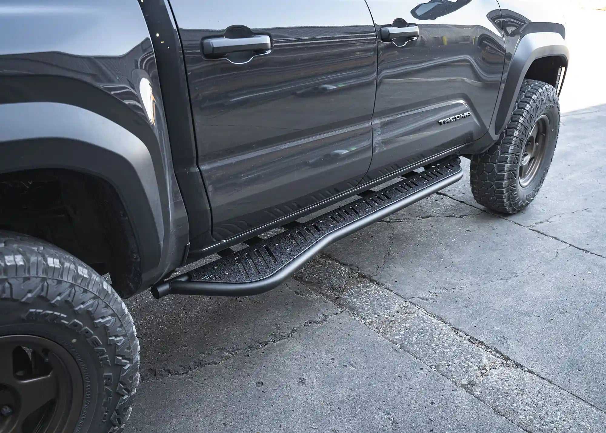 Close up of the removable aluminum top plate for the side step on the 2024+ Toyota Tacoma Rock Sliders from Backwoods Adventure Mods