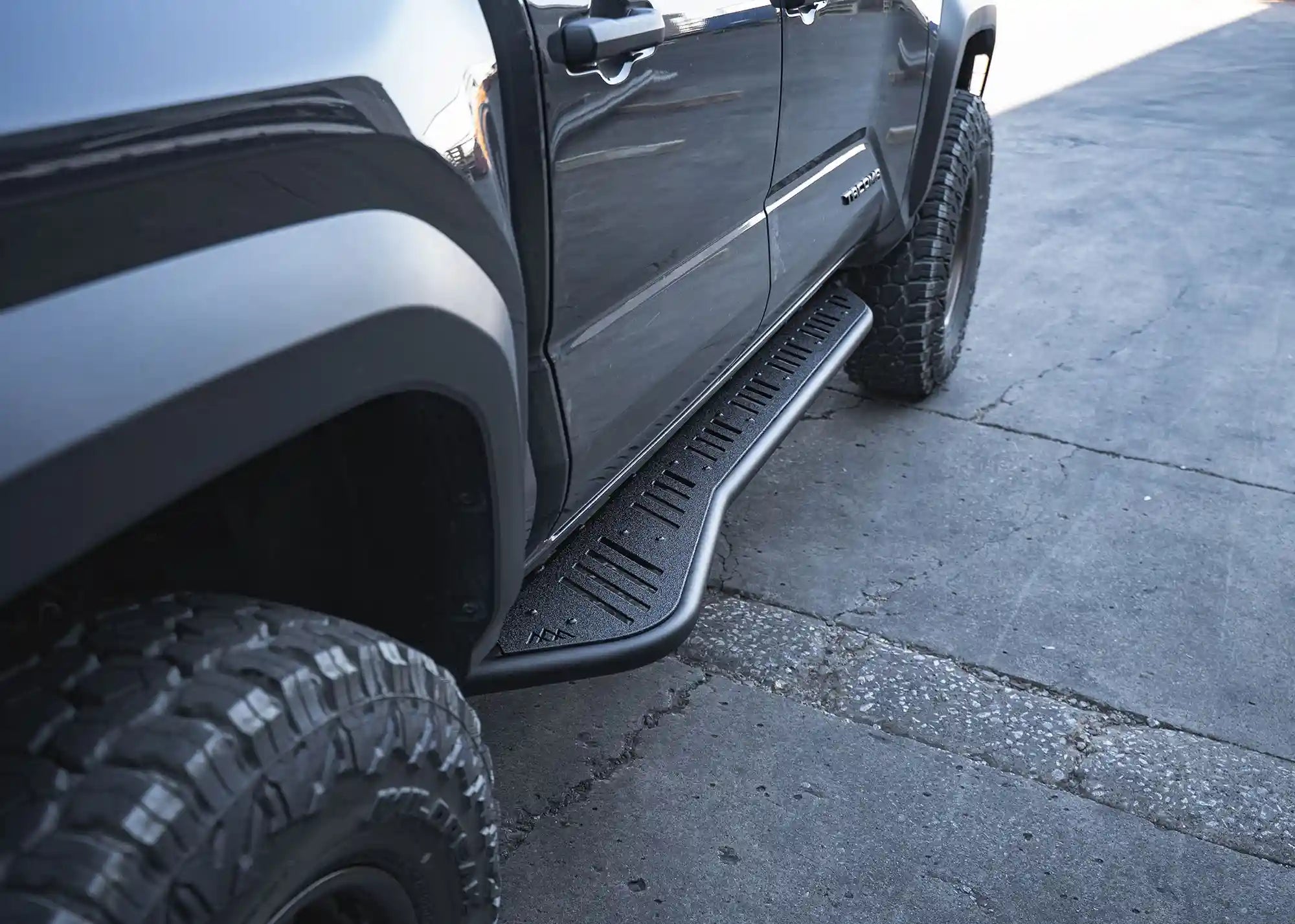 2024+ Toyota Tacoma Rock Sliders from Backwoods Adventure Mods installed on a 4th Gen Tacoma