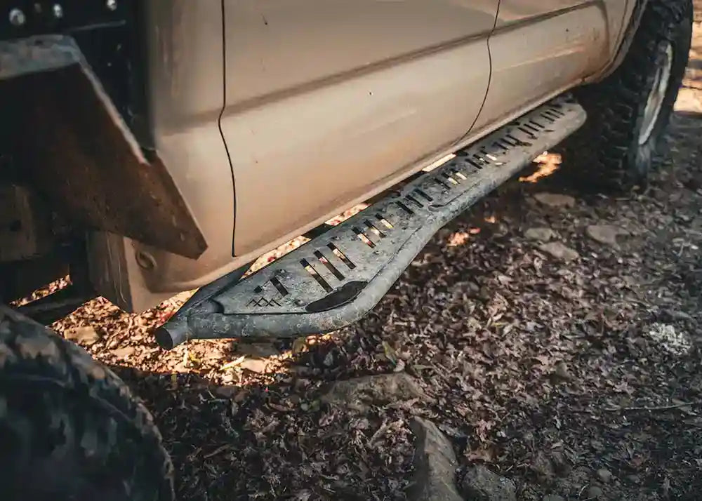 Backwoods Adventure Mods 2005-2023 2nd and 3rd Gen Toyota Tacoma Rock Sliders in use while off roading