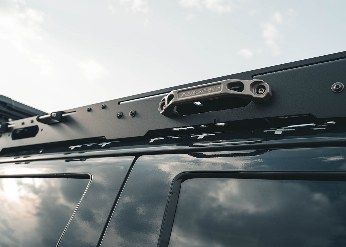 Agency 6 aluminum handles installed on the Backwoods Adventure Mods DRIFTR roof rack for 3rd Gen Toyota Tundra to help reach cargo rack storage
