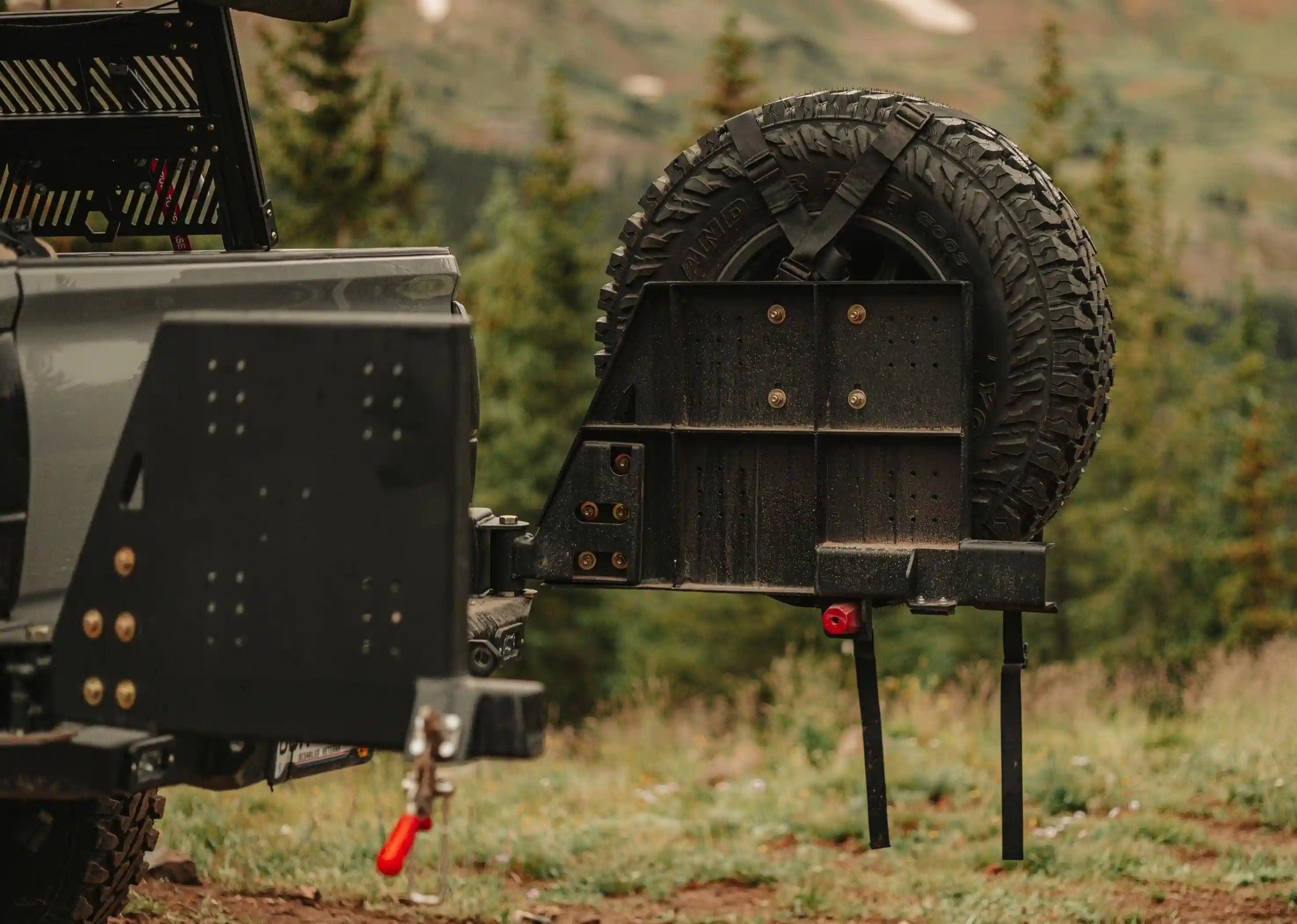 Image of the 2016-2023 3rd Gen Toyota Tacoma Hi-Lite High Clearance Dual Swing Out Rear Bumper from Backwoods Adventure Mods with both swing outs open