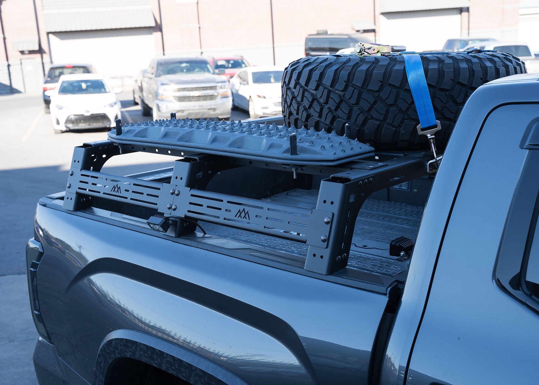 Backwoods Adventure Mods 3rd Gen Toyota Tundra Mid Height Bed Rack with optional dogbone traction board mount installed