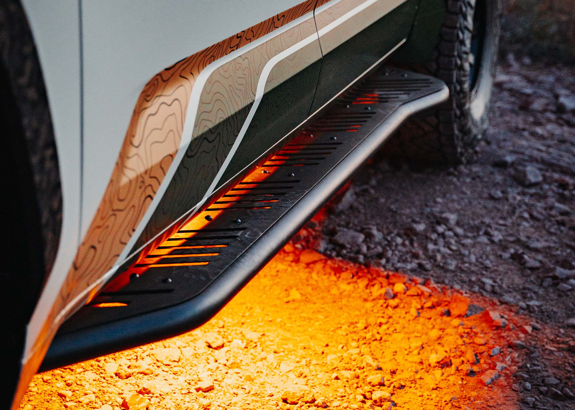 Driver-side close up image of Backwoods Adventure Mods Rock Sliders on a 3rd Gen Toyota Tundra