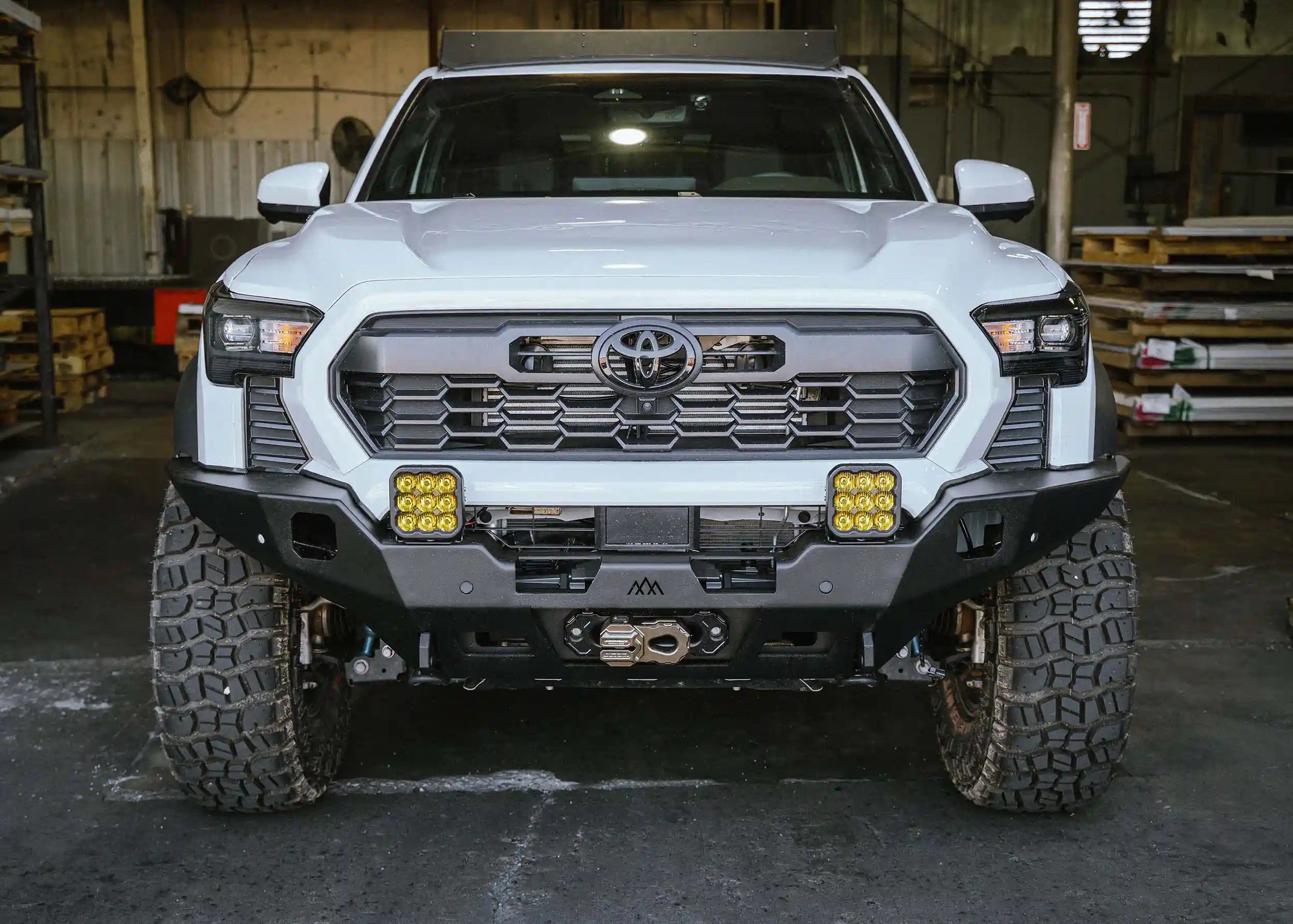 2024 4th Gen Toyota Tacoma with Backwoods Adventure Mods Hi-Lite Overland Front winch Bumper installed for high clearance off road