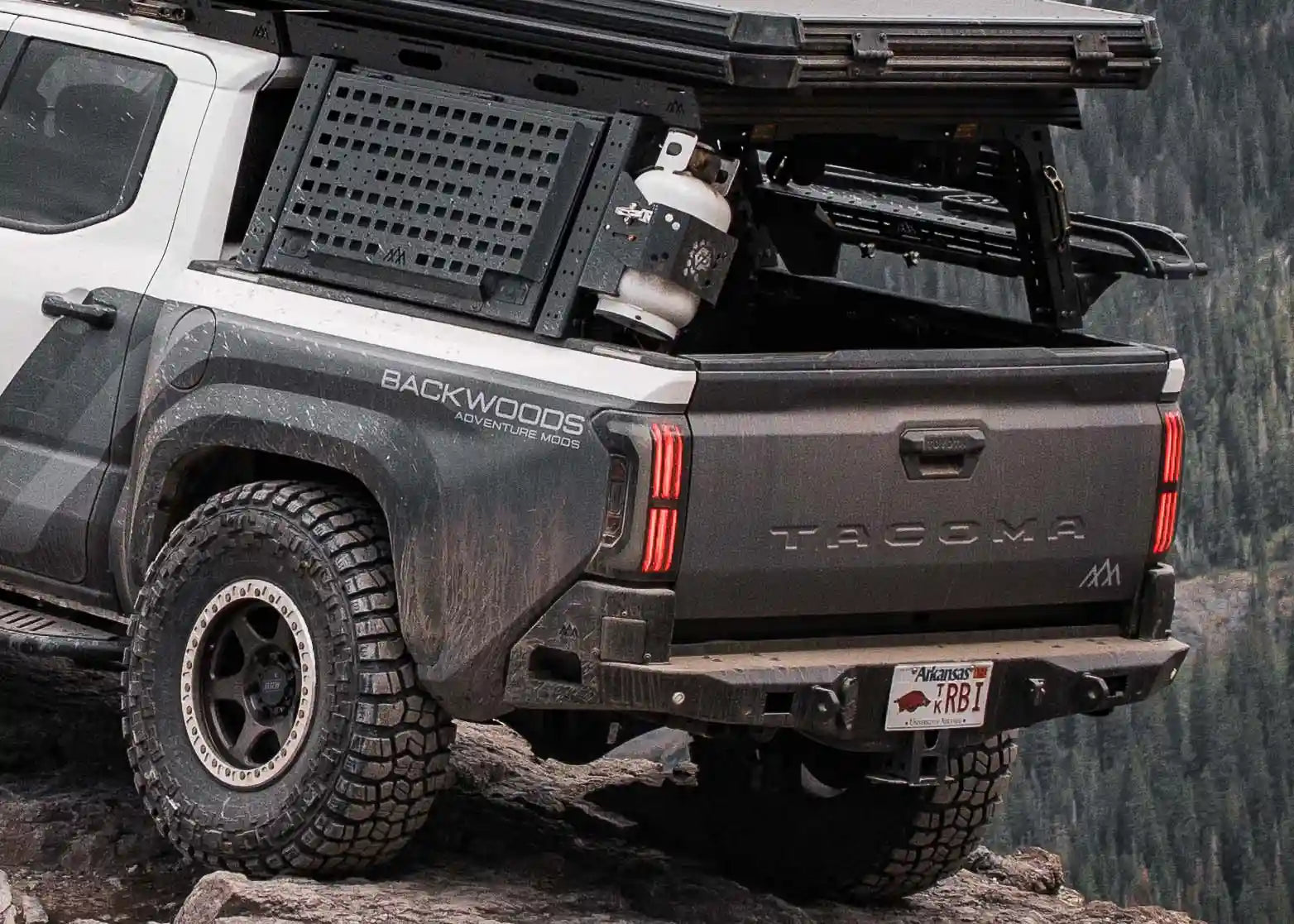 Backwoods Adventure Mods 2024 Toyota Tacoma Rear Bumper installed on a 4th gen Tacoma driving off road