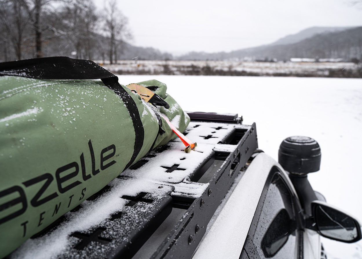 Backwoods Adventure Mods Toyota 2010-2024 5th Gen 4Runner DRIFTR Roof Rack cargo carrier storing gear while camping in the snow