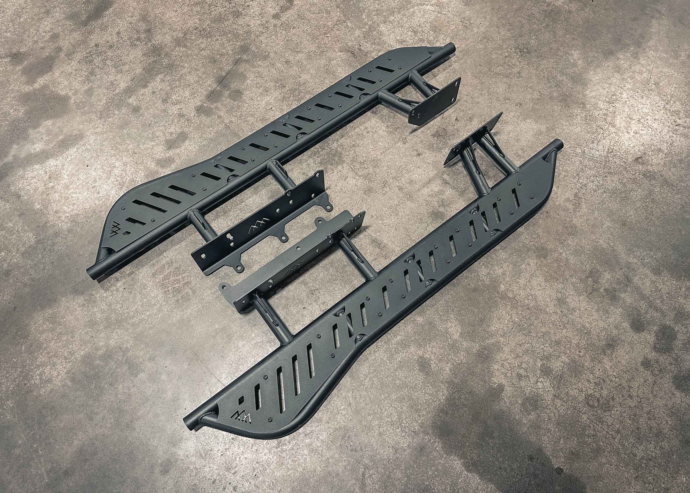 Image showing the mounting brackets of the Backwoods Adventure Mods 2010-2024 5th Gen Toyota 4Runner bolt-on Rock Sliders