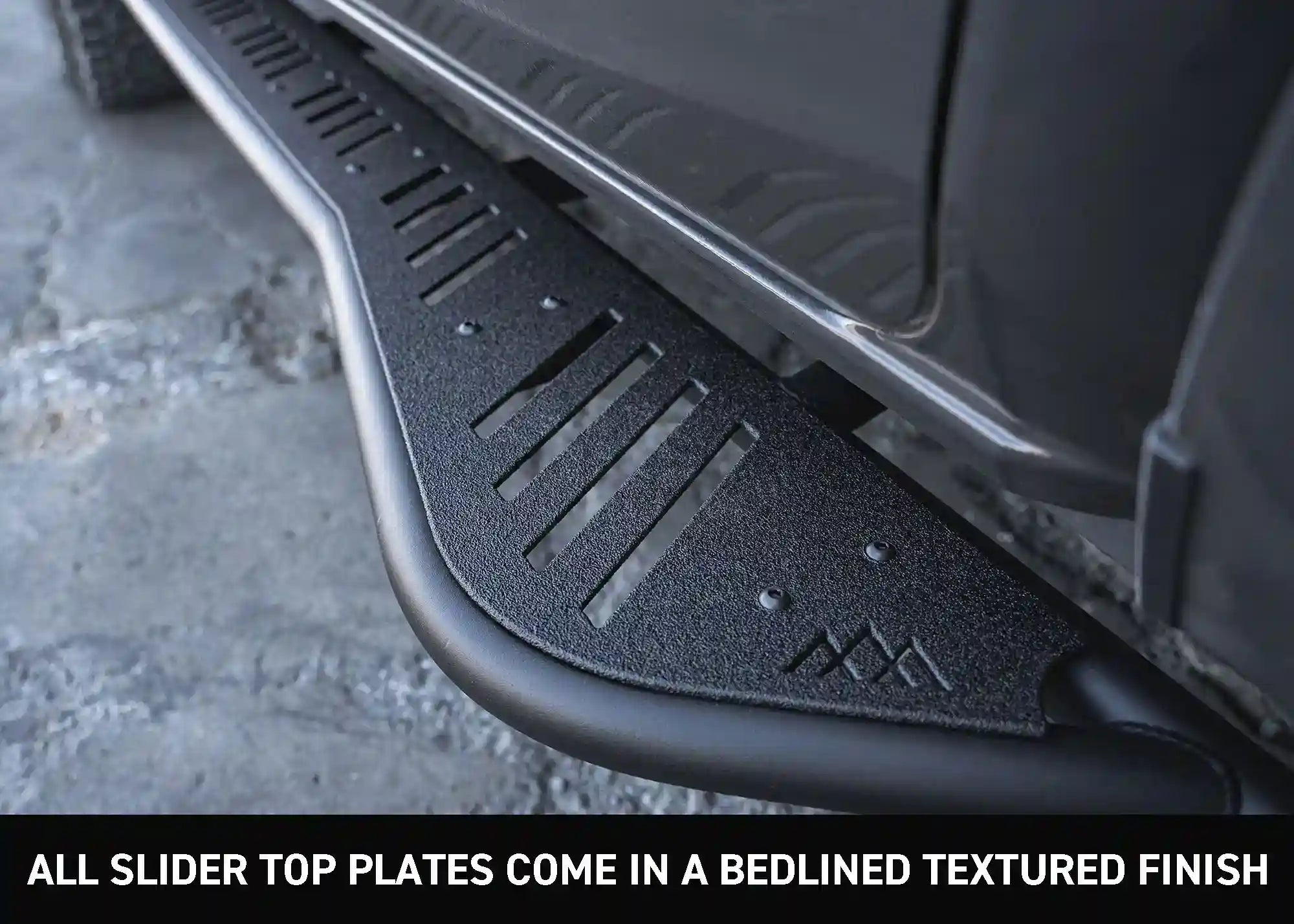 Close up image of the texutred finish on the top plate of the Backwoods Adventure Mods 2010-2024 5th Gen Toyota 4Runner Rock Sliders