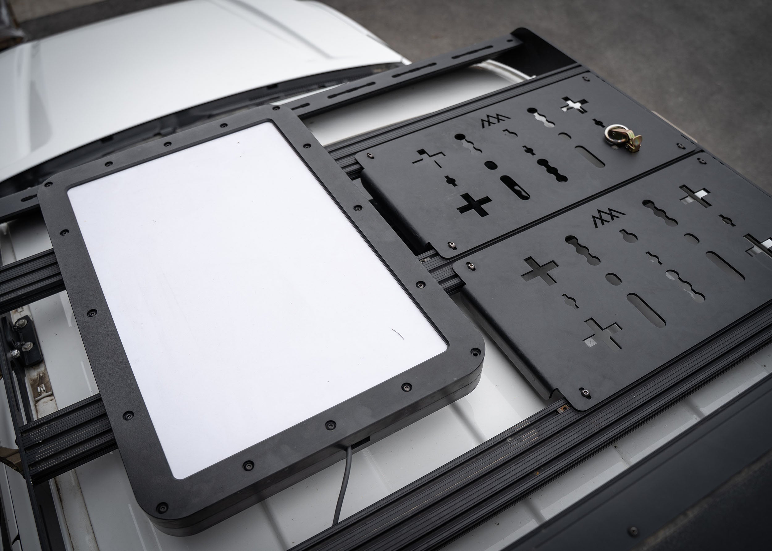 Close up image of the DRIFTR 4th Gen 2024+ Toyota Tacoma Roof Rack with a starlink kit installed