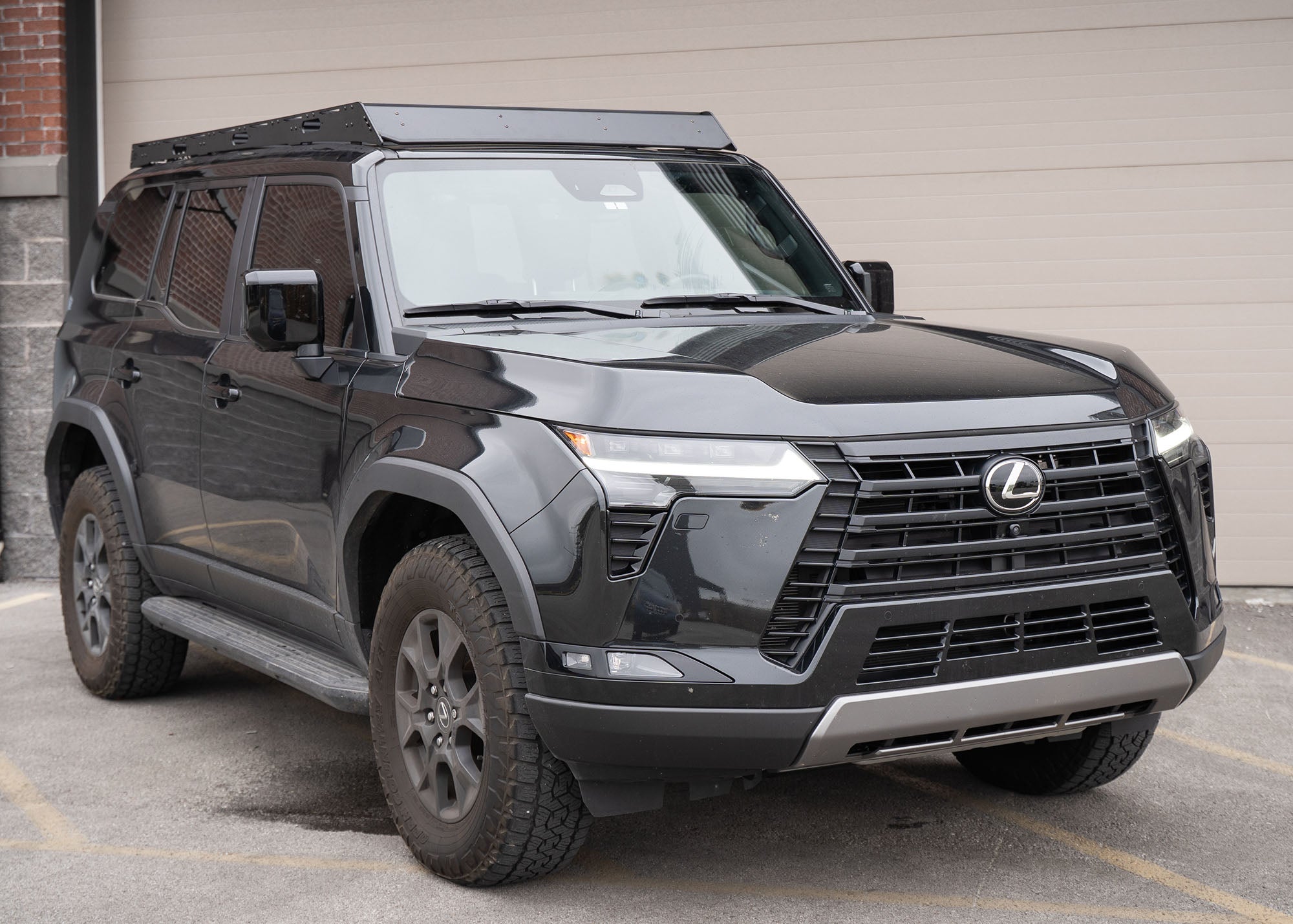 lexus gx550 with a roof rack on top front view