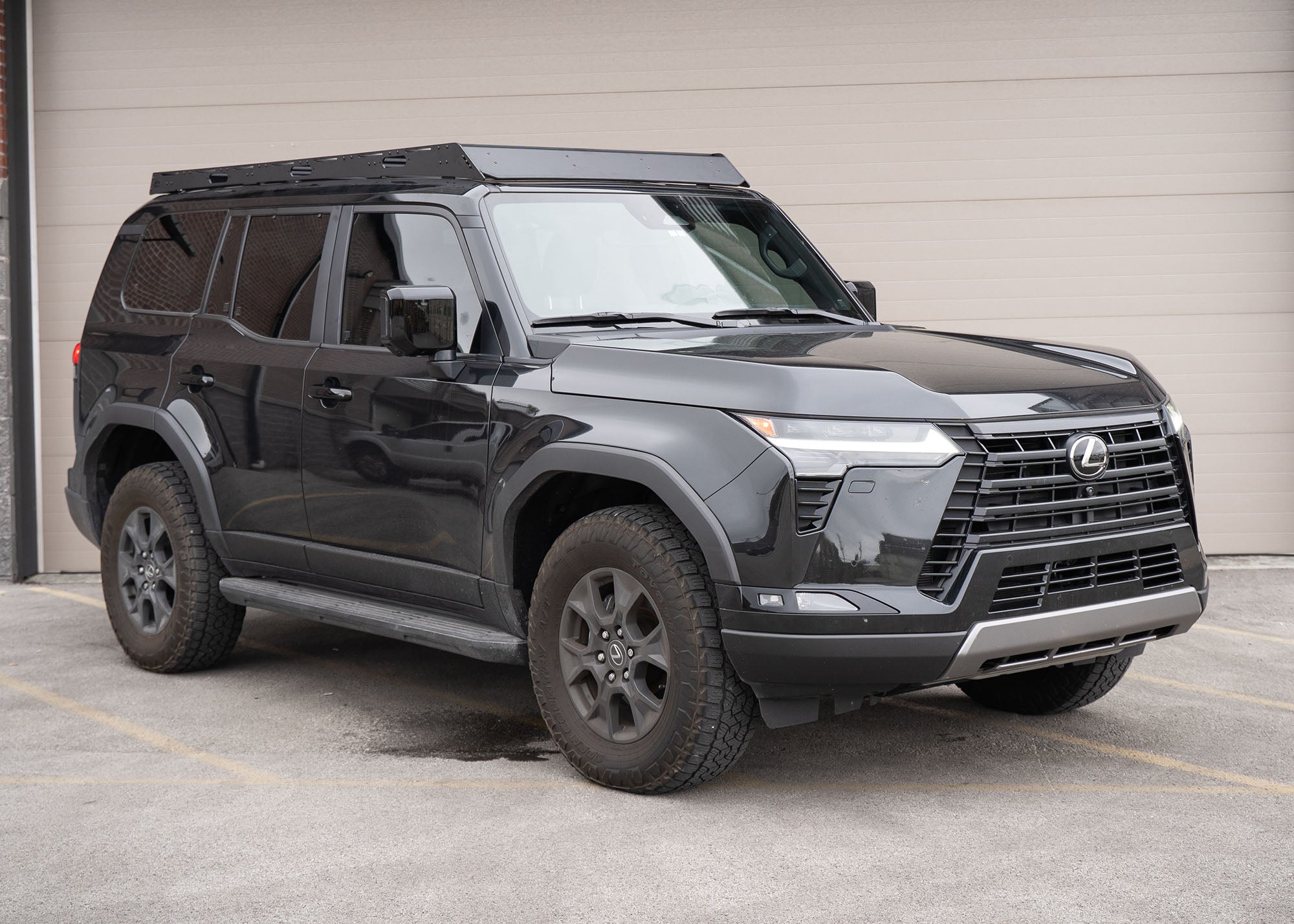 Black Lexus 2024 GX550 with a DRIFTR roof rack from Backwoods