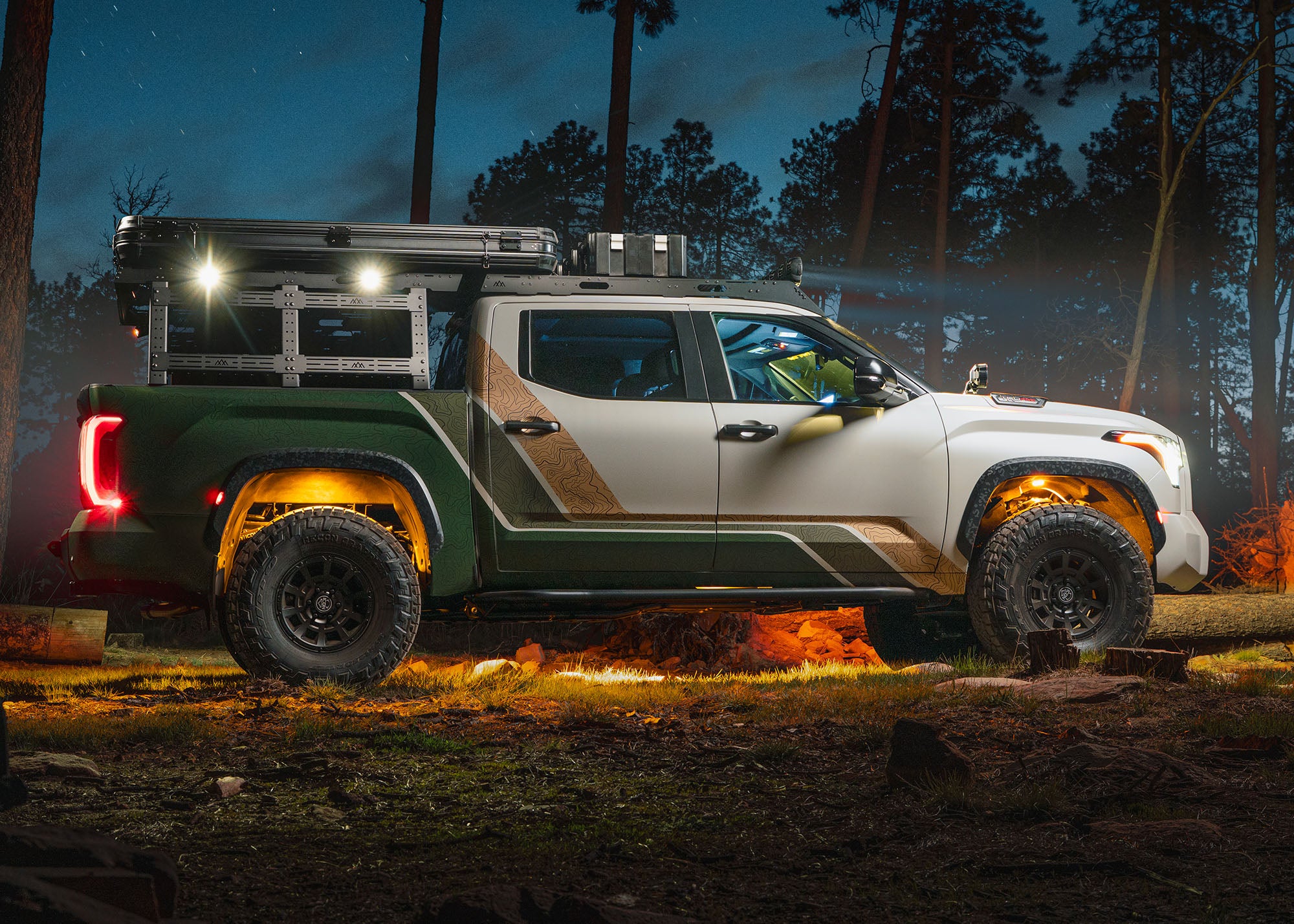 Side view of the Backwoods Adventure Mods overland truck bed rack and roof rack modular truck bed storage system installed on a 3rd gen Toyota Tundra