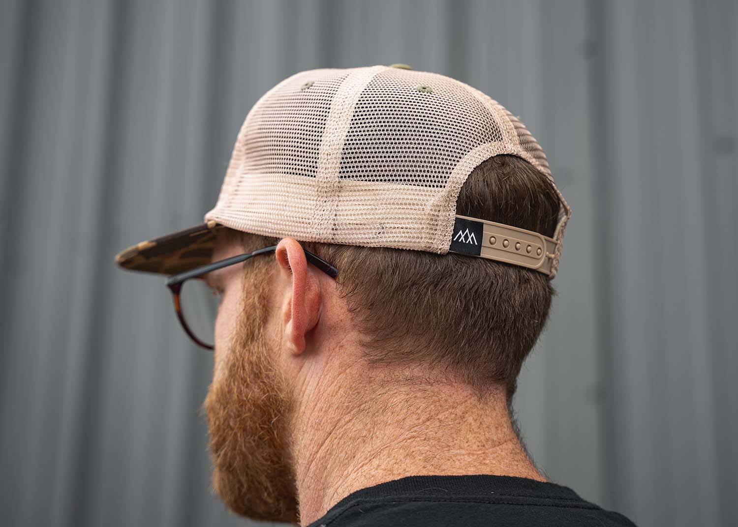 Image showing the back of the Backwoods Adventure Mods Camo Trucker hat baseball cap