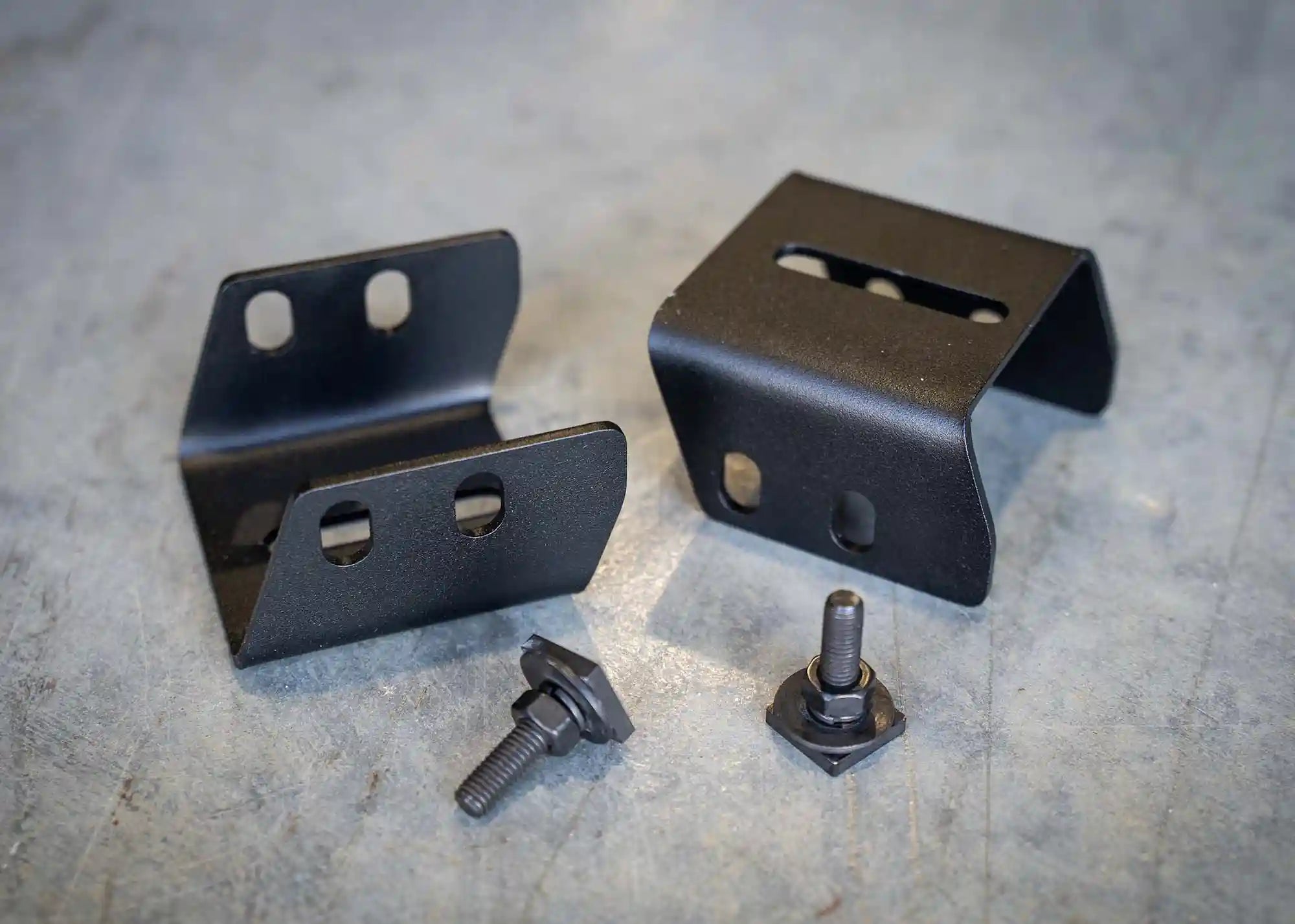 Close up of hardware for Truck Bed Rack Mount for Retrax Retractable Bed Covers | Backwoods Adventure Mods