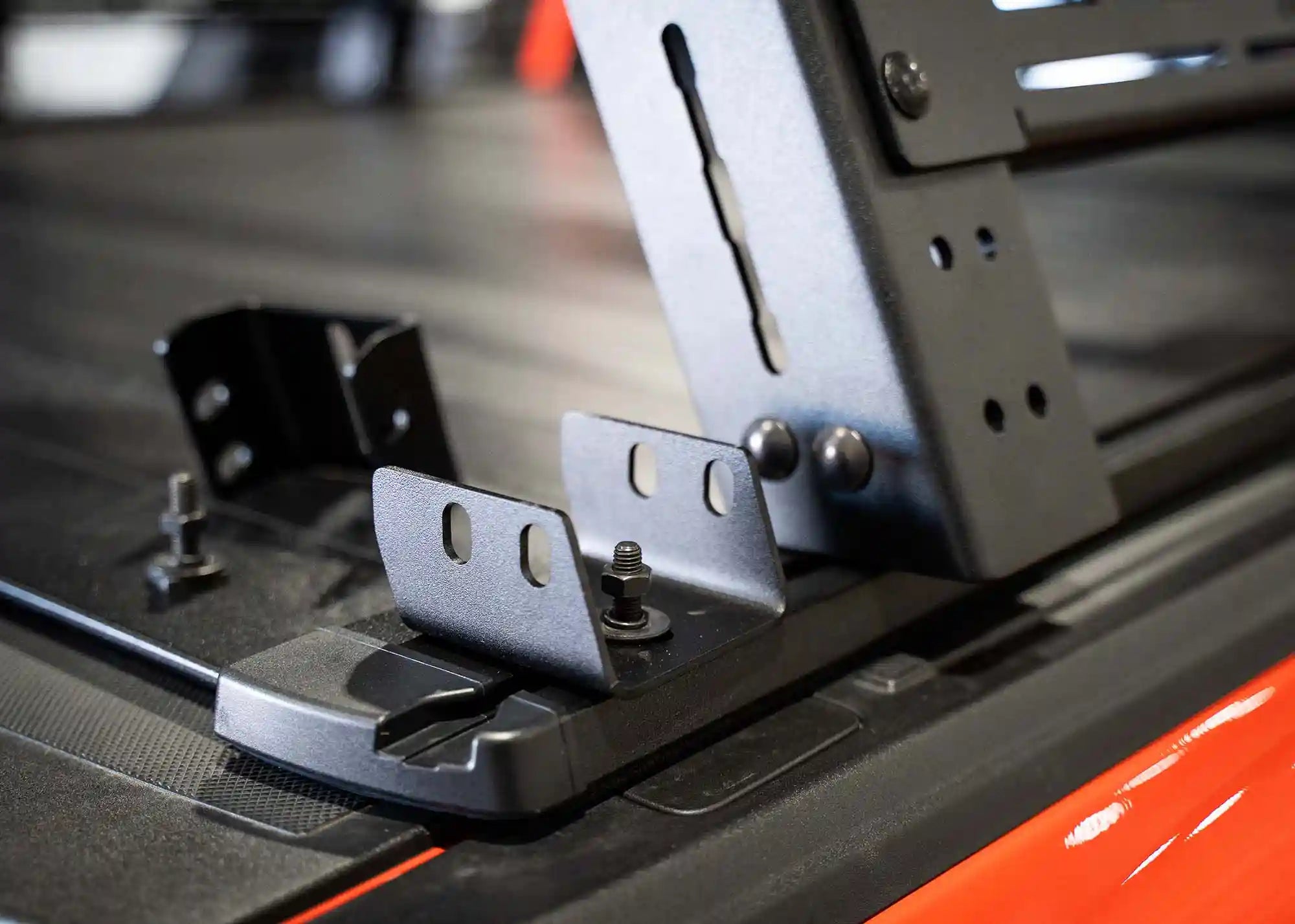 Close up of Truck Bed Rack Mount for Retrax Retractable Bed Covers | Backwoods Adventure Mods