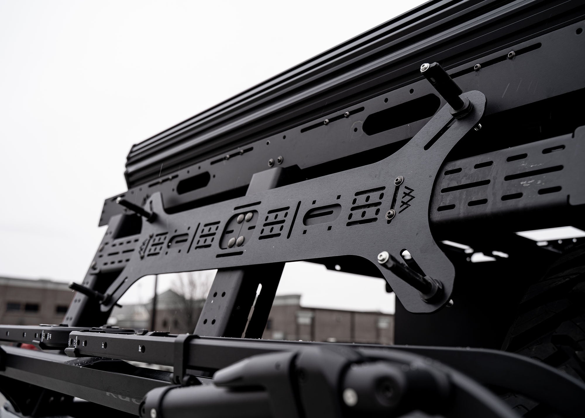 Close up of the installation hardware for the Backwoods Adventure Mods Dogbone Universal Traction Board Mount for off road recovery boards