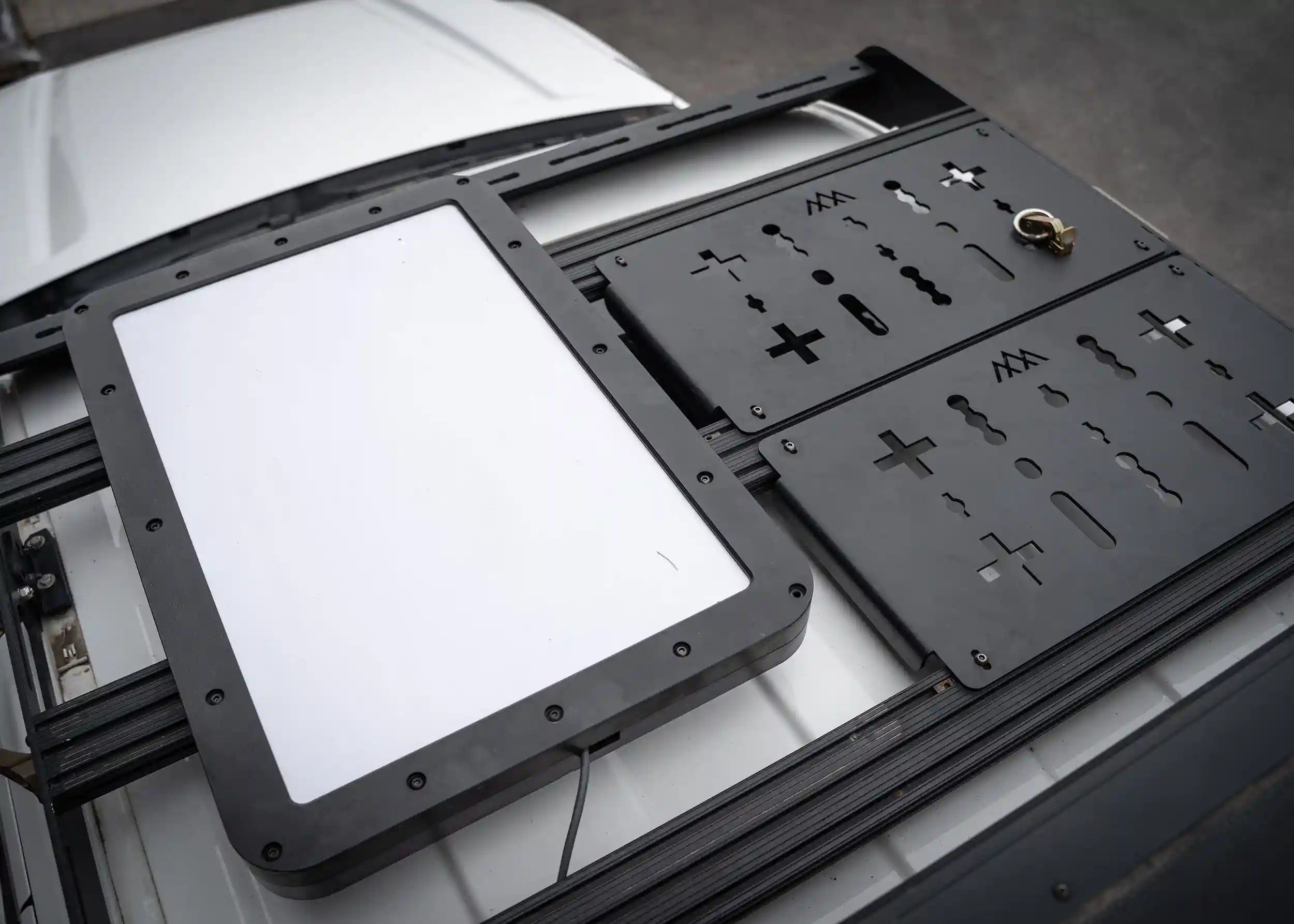 Close up image of the DRIFTR 4th Gen 2024+ Toyota Tacoma Roof Rack with a starlink kit installed