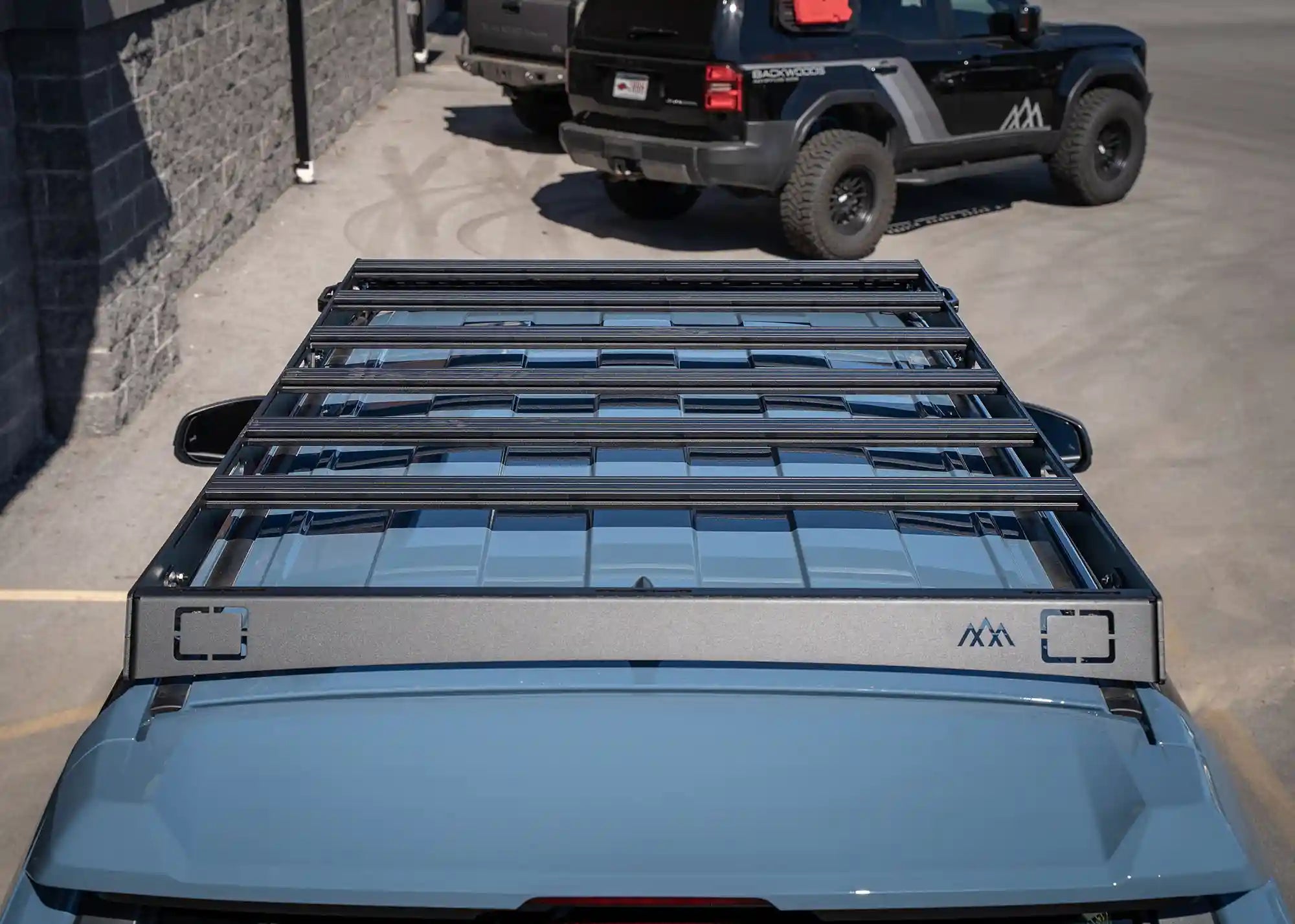 Front facing image of the DRIFTR 6th Gen Toyota 4Runner Roof Rack from Backwoods Adventure Mods