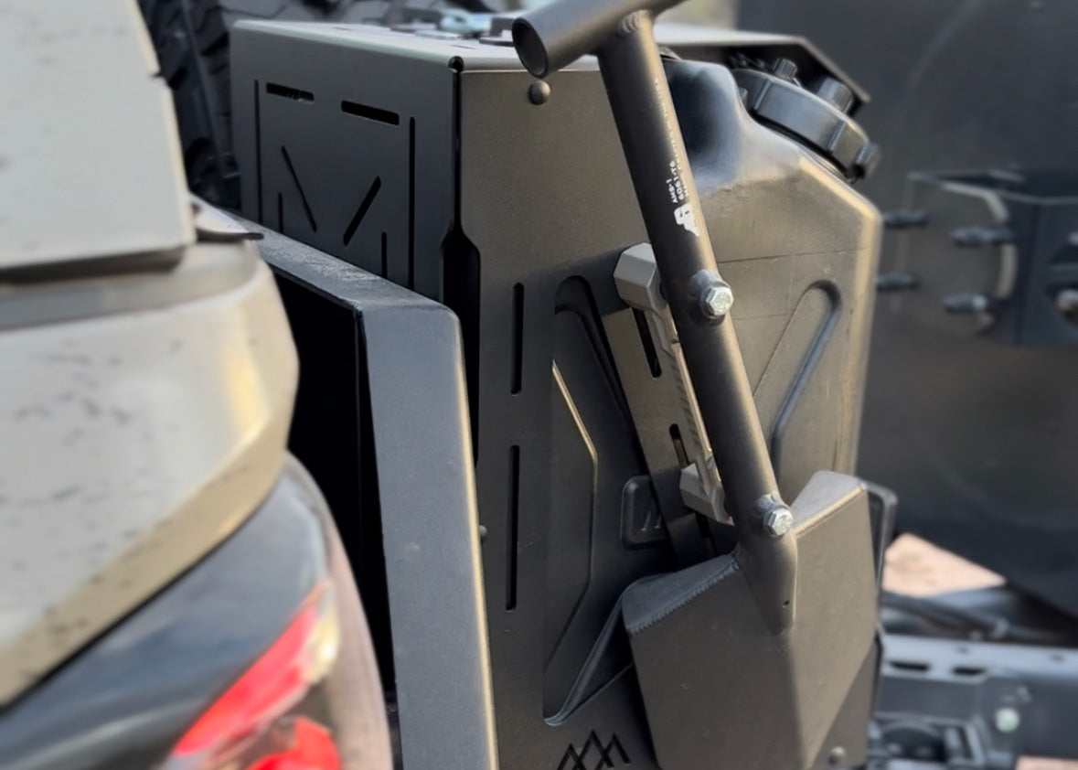 Backwoods Adventure Mods Jerry Can Holder Mount with an Agency 6 off road shovel mounted to the side