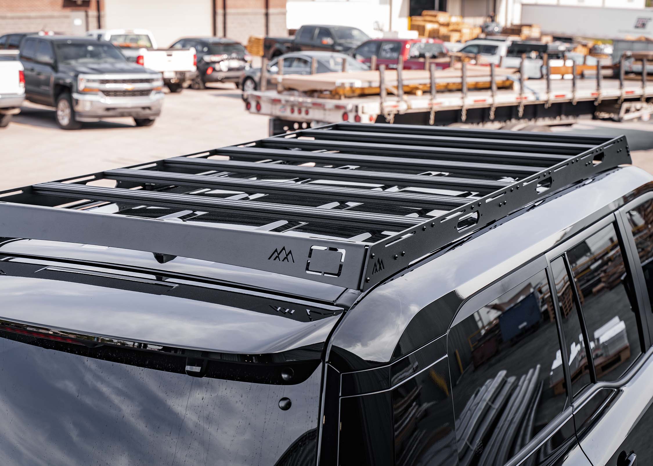 Toyota Land Cruiser DRIFTR roof rack with t-track load bars and accessory mounts by Backwoods Adventure Mods