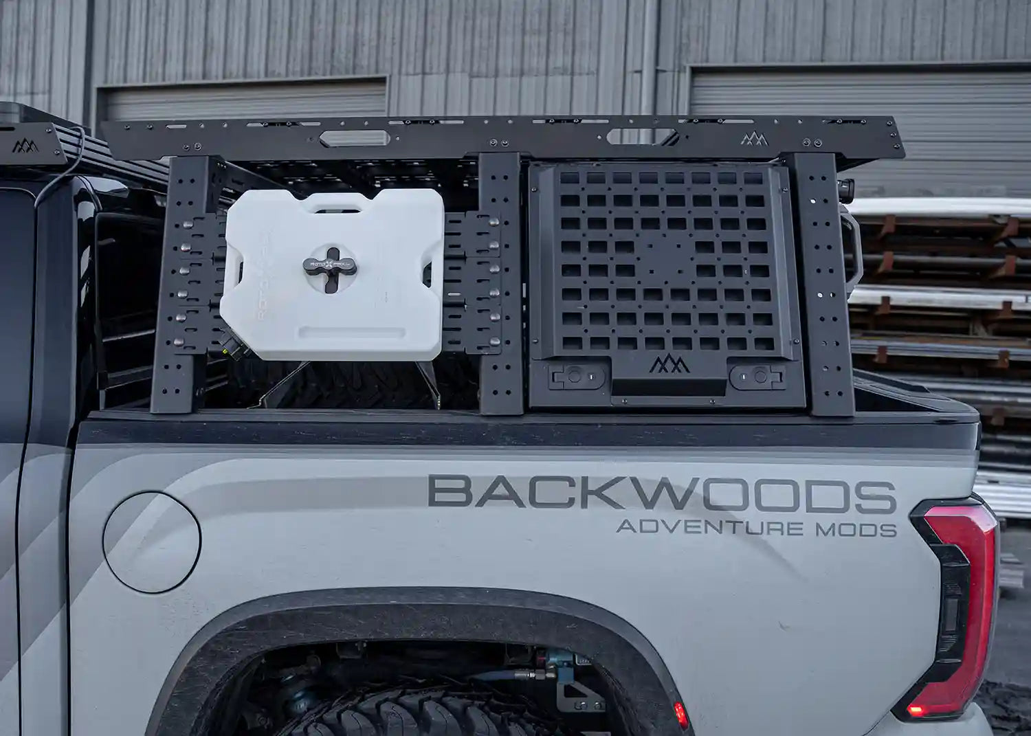 Toyota Tundra Aluminum Bed Rack locking cargo Storage Box installed as part of the Backwoods Adventure Mods modular overland bed rack cargo storage system