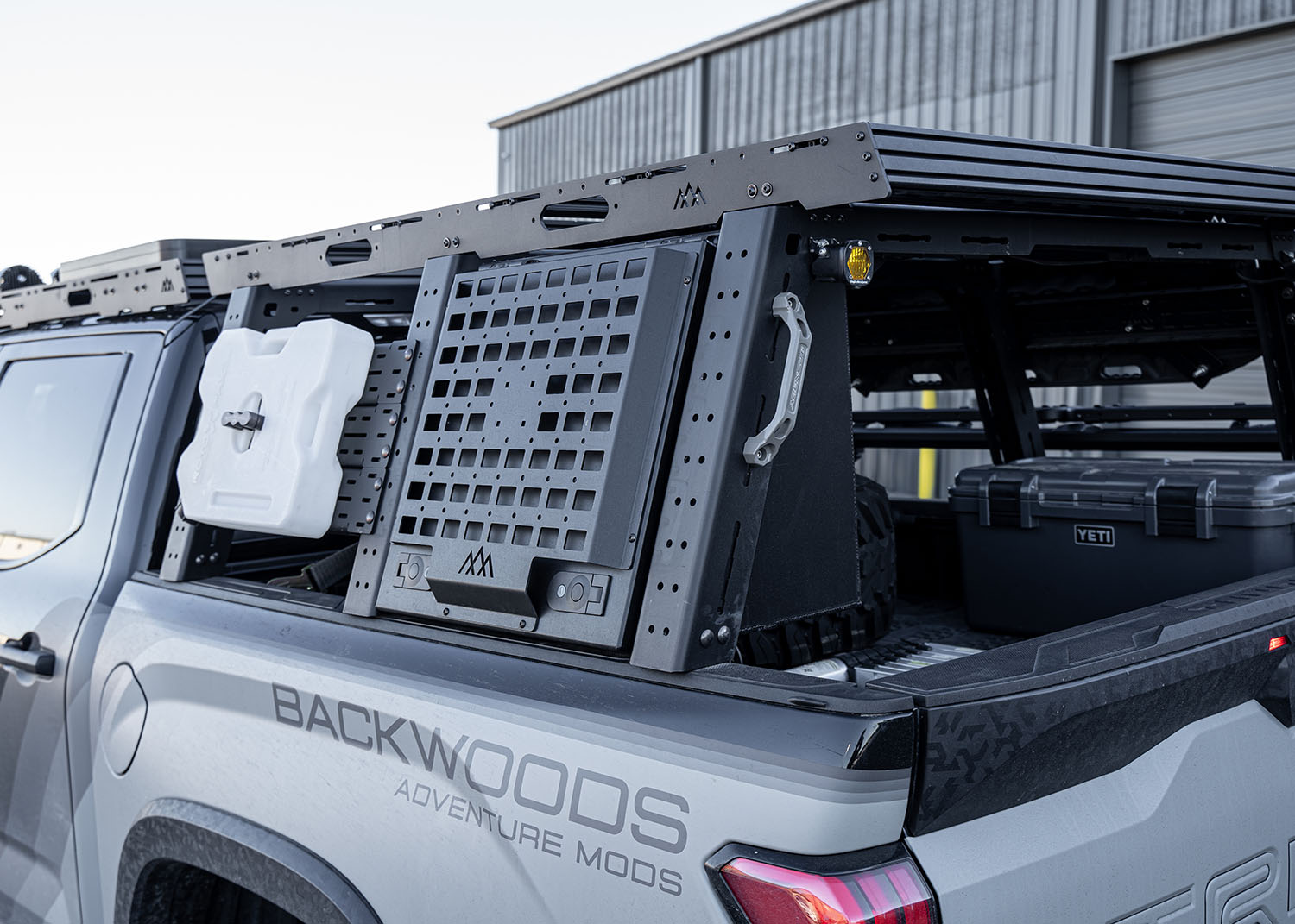 Front of the Backwoods Adventure Mods Toyota Tundra Aluminum Bed Rack Storage Box with lid closed
