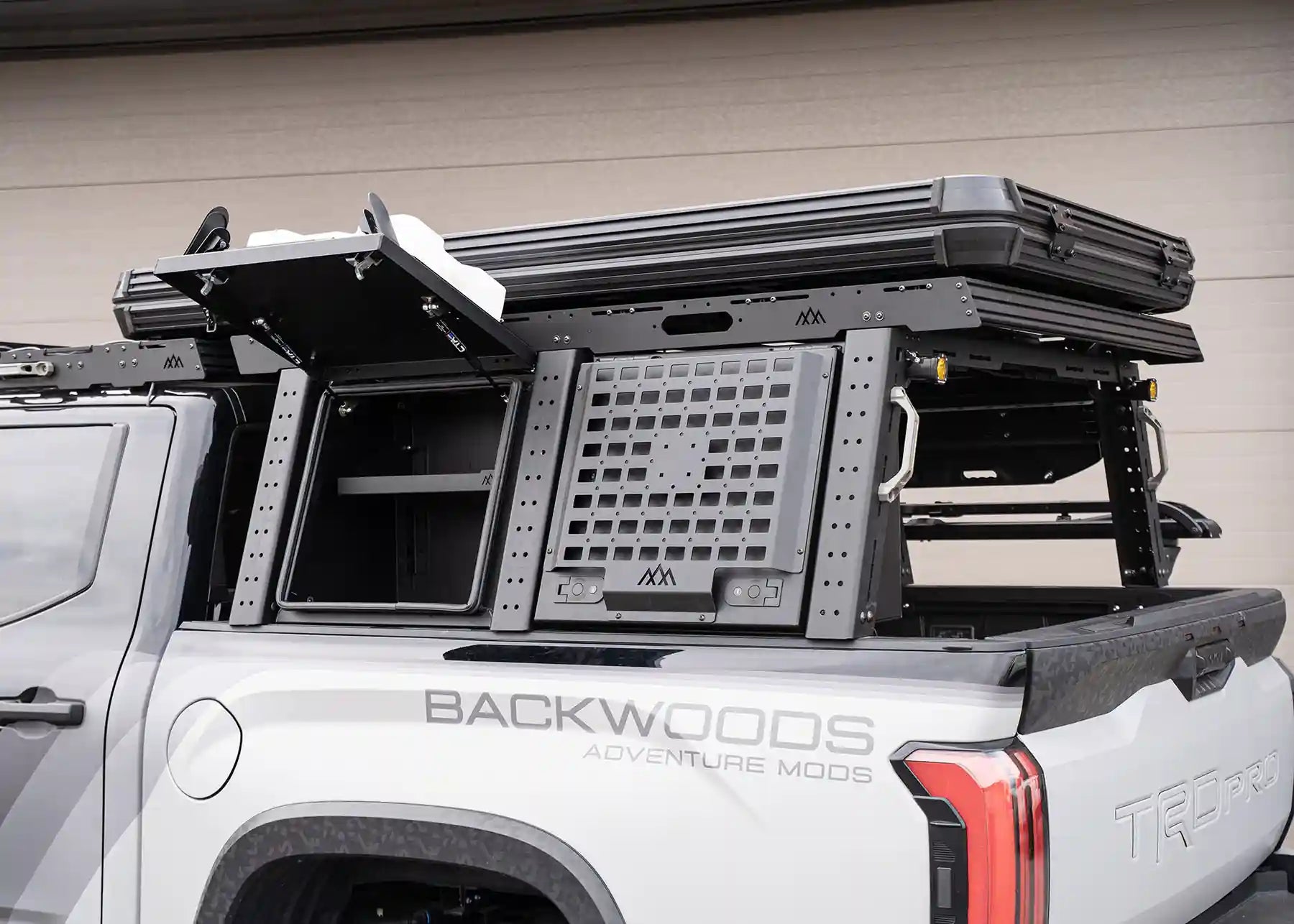 Backwoods Adventure Mods Toyota Tundra Aluminum Bed Rack Storage Box, installed as part of the modular overland bed rack cargo storage system