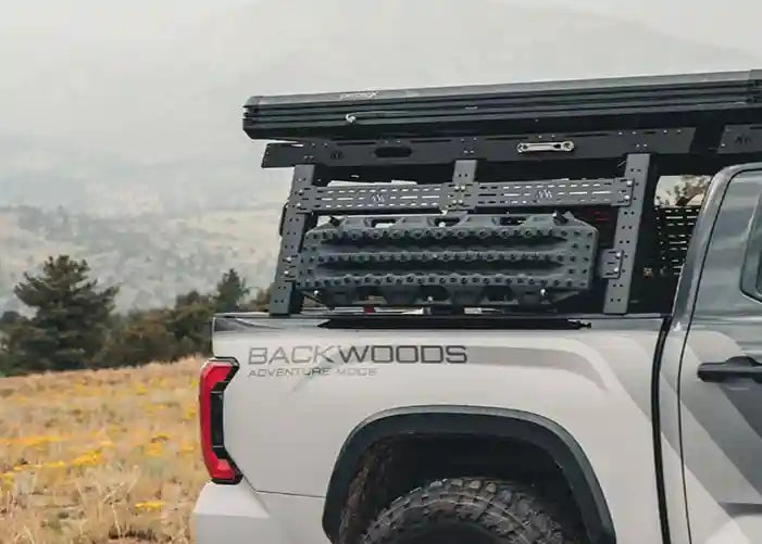 Toyota Tundra overland build with a Backwoods Adventure Mods Truck Bed Rack System Starter Bundle installed for organizing cargo and off road gear