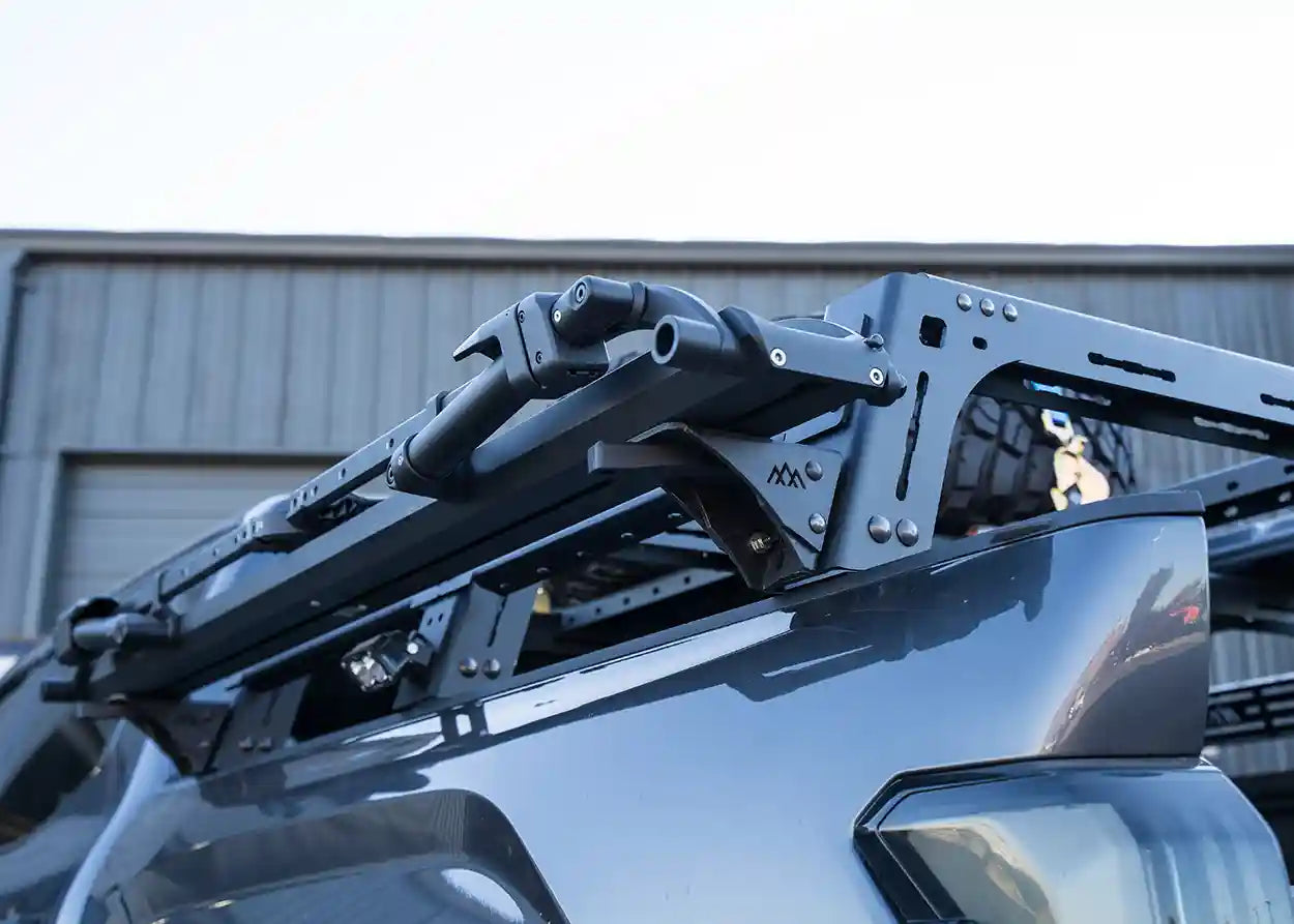 Close up of the installed Universal Truck Bed Rack Bike Tray Mounts from Backwoods Adventure Mods