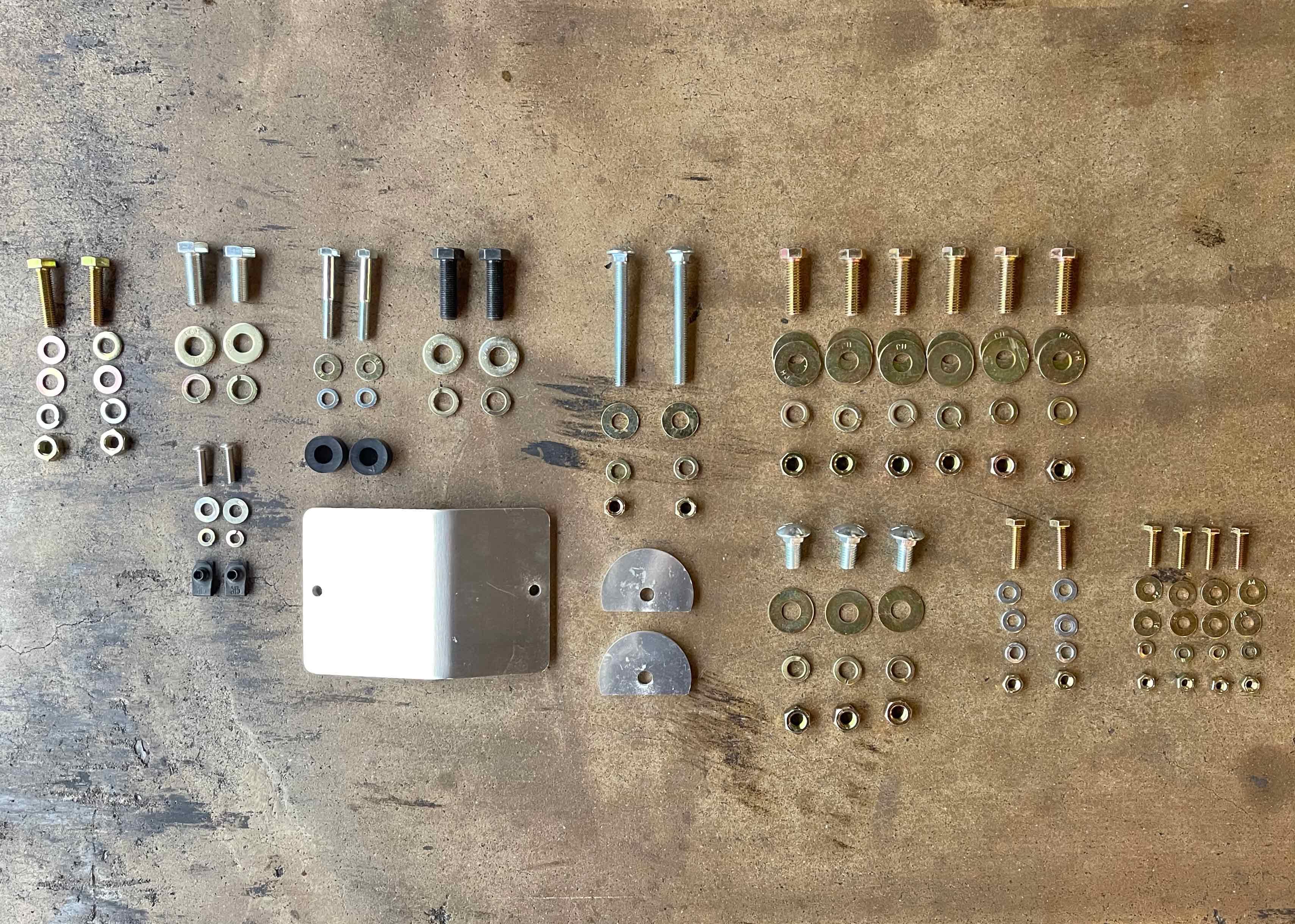 Installation hardware included with Backwoods Adventure Mods 2005-2023 2nd and 3rd Gen Toyota Tacoma Full Skid Plate Kit