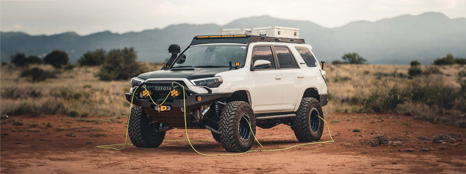 A Toyota 4Runner with roof rack and off road bumper installed ready to hit the trails and overland.