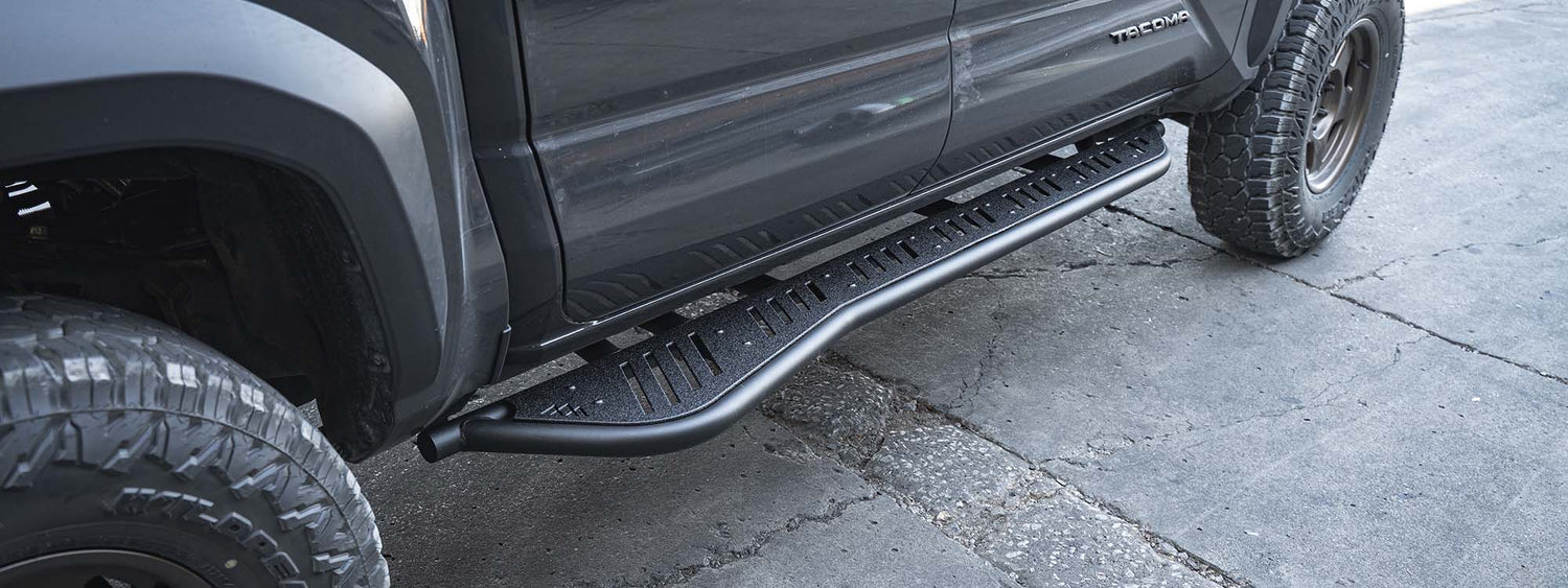 a rock slider installed on a 2024 toyota tacoma