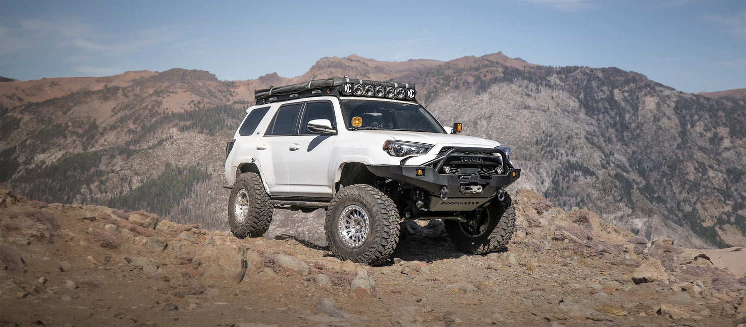 Toyota 4Runner with Backwoods Adventure Mods Off-Road Accessories installed driving off road in the mountains