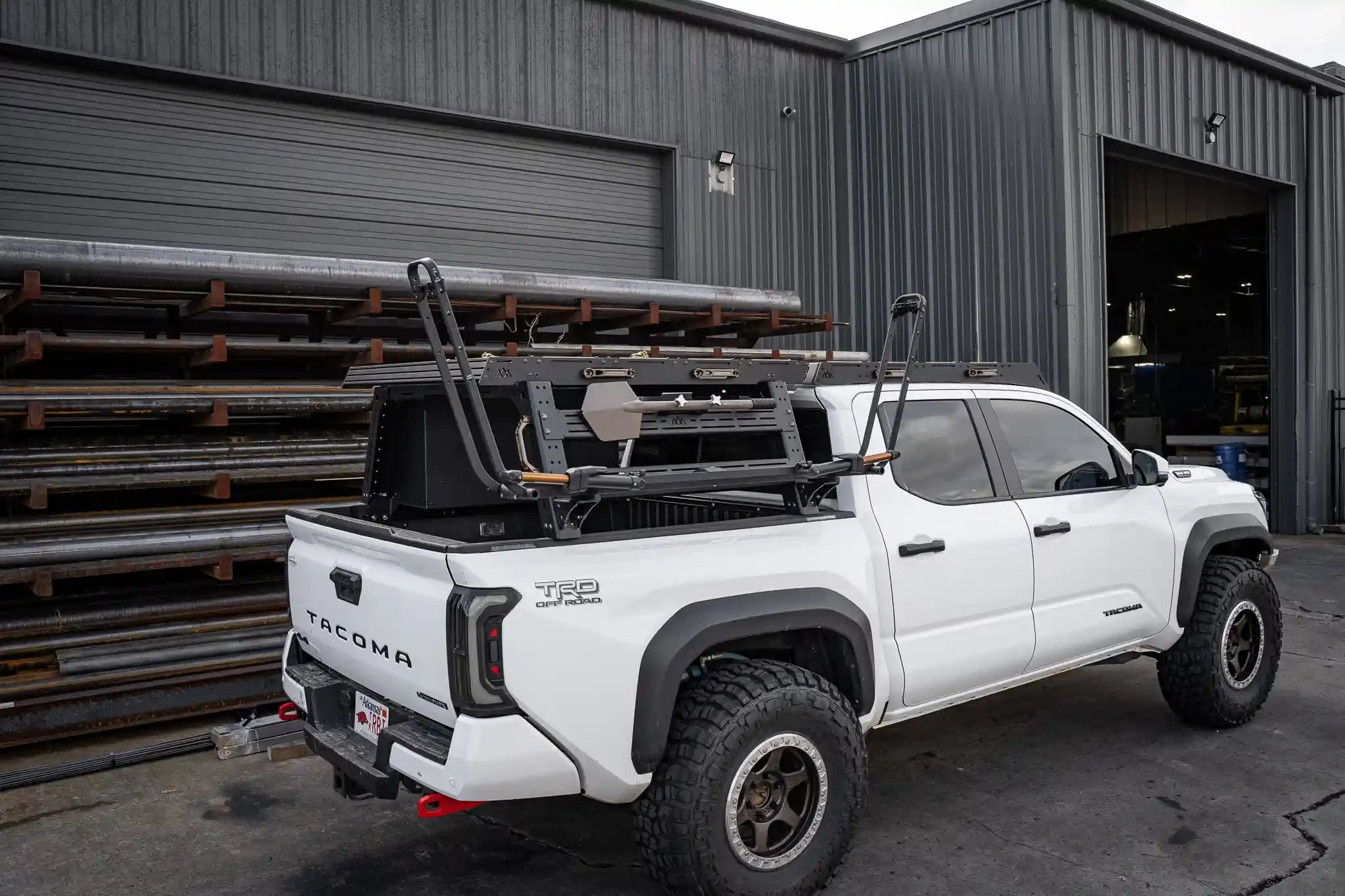 Backwoods Adventure Mods overland modular truck bed rack and roof rack with accessories installed on a 2024 4th gen Toyota Tacoma