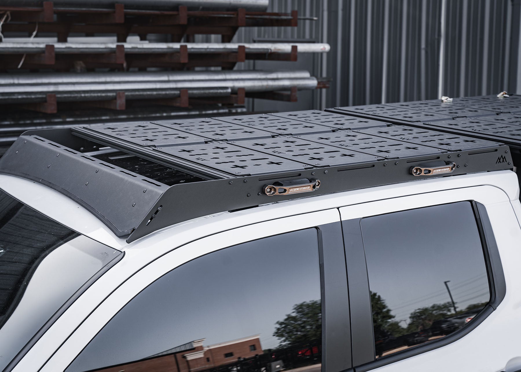 Backwoods Adventure Mods DRIFTR roof rack installed on a white 2024 4th gen Toyota Tacoma