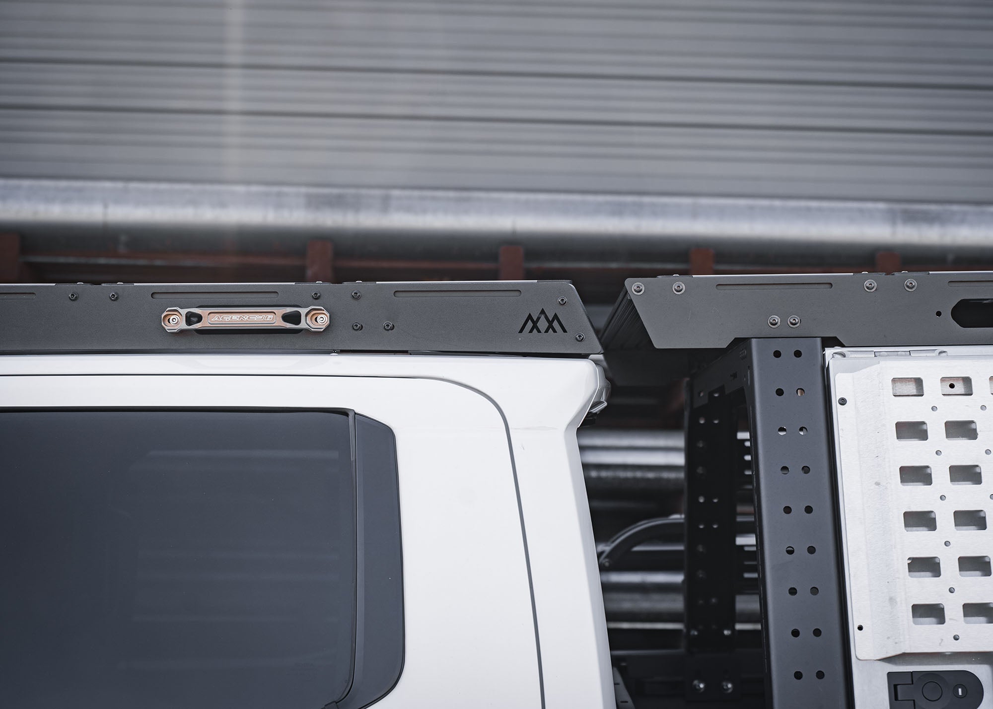 Image showing the comination of Backwoods Adventure Mods DRIFTR bed rack and roof rack installed on a 4th gen 2024 toyota tacoma overland build