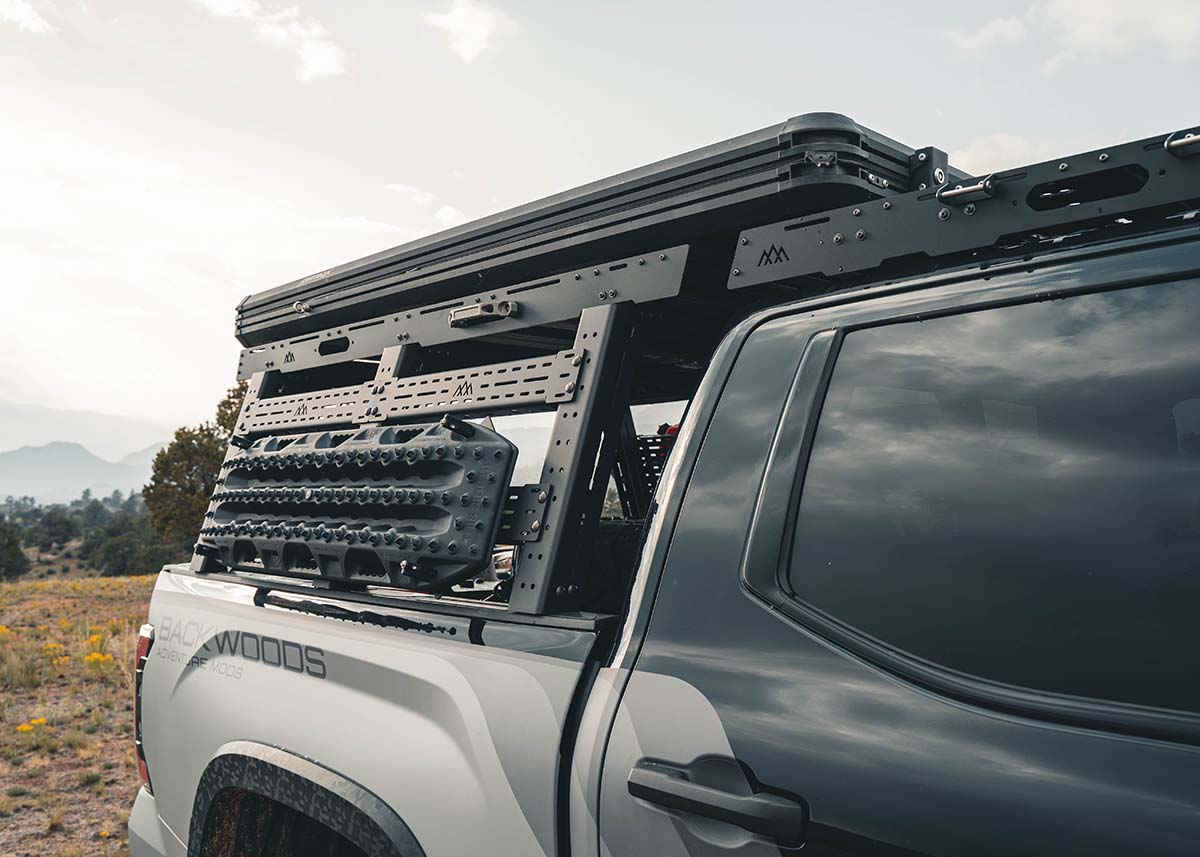 Image showing various gear storage and mounting options for the Backwoods Adventure Mods Full Height 3rd Gen Toyota Tundra Truck Bed Rack 