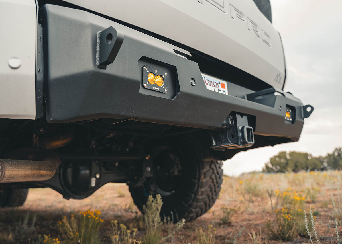Image showing surface mount lights installed on the Backwoods Adventure Mods 3rd Gen Toyota Tundra Rear Bumper