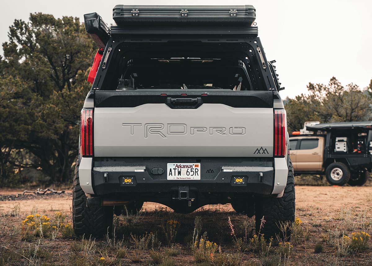 White Toyota Tundra with Backwoods Adventure Mods 2022+ 3rd Gen Tundra Rear Bumper installed
