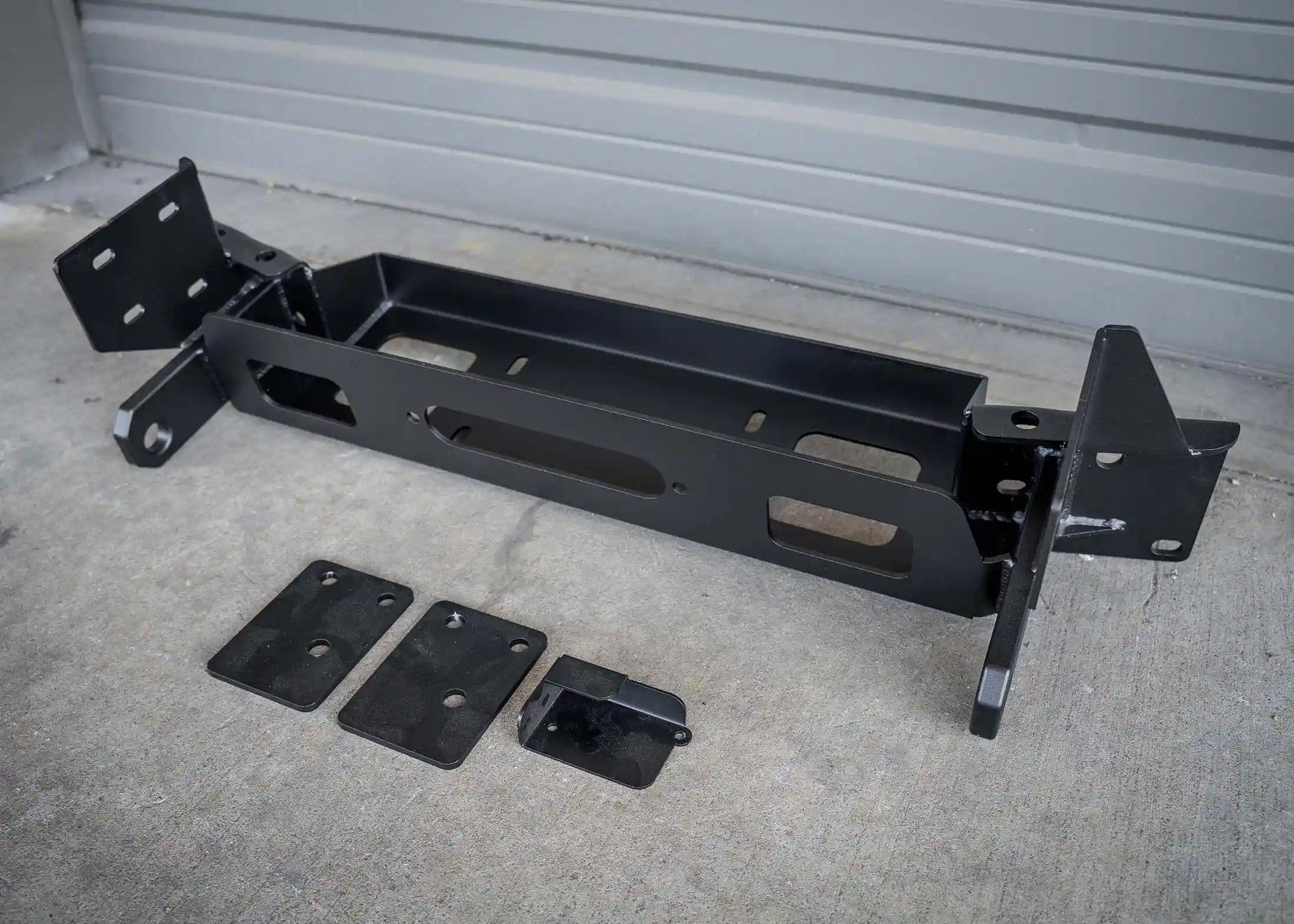 Installation hardware and winch cradle included with the Backwoods Adventure Mods Hi-Lite Overland Front Bumper