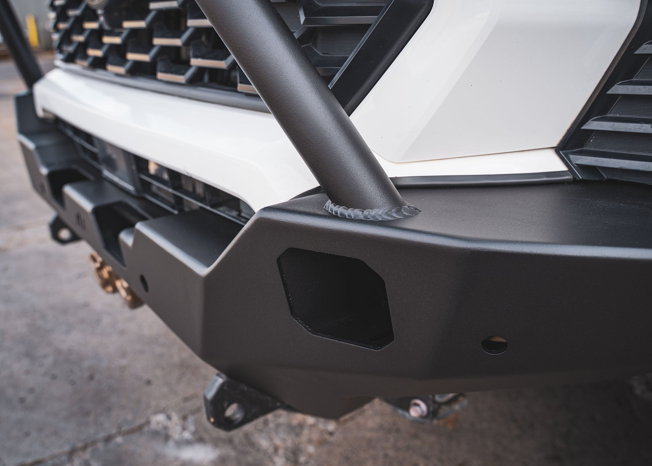 Off road pod light cutout on the Backwoods Adventure Mods 2024 Toyota Tacoma 4th Gen Hi-Lite Overland Front Bumper with Bull Bar
