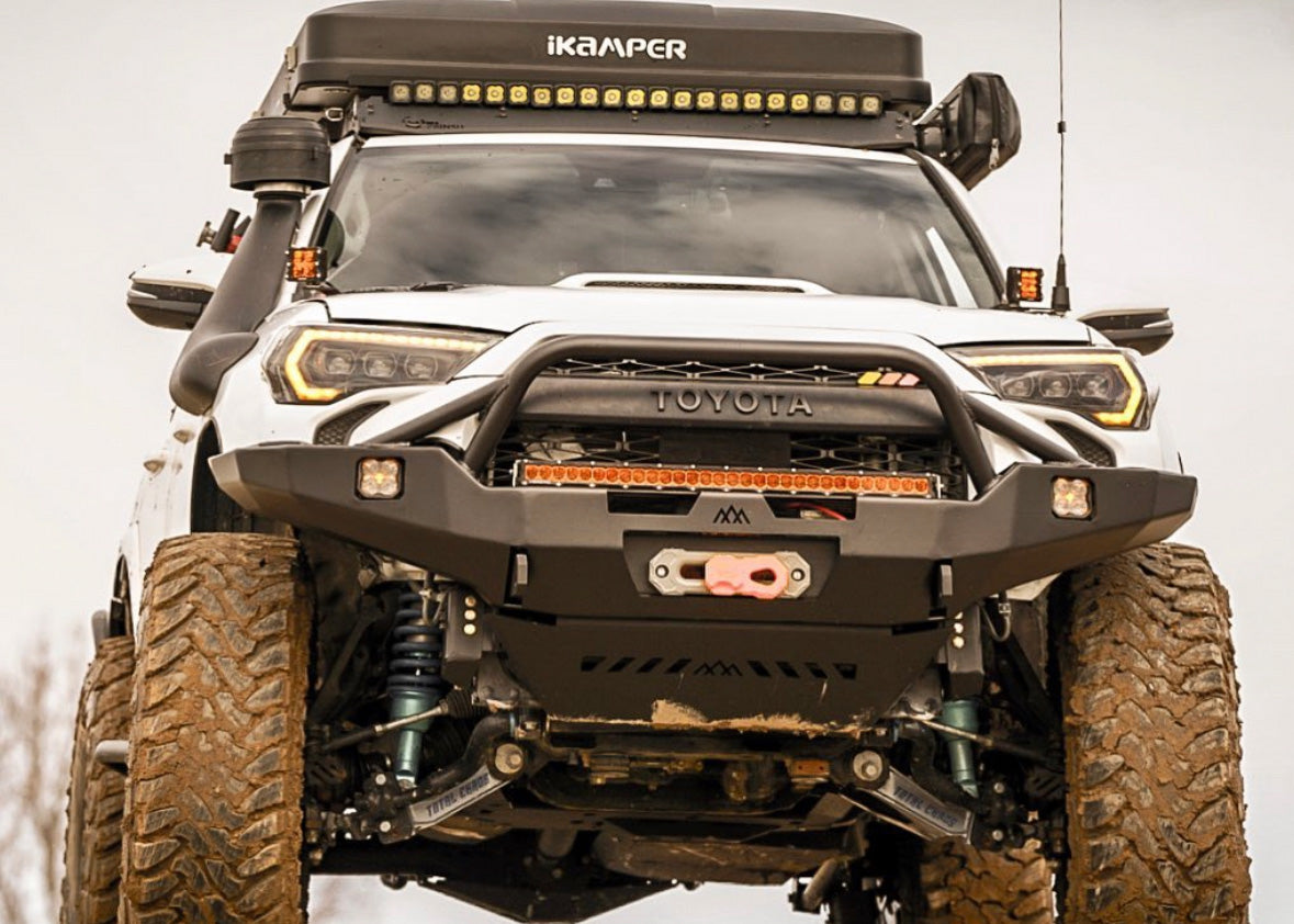 Backwoods Adventure Mods 2010-2024 Toyota 4Runner High-Clearance Prerunner Bull Bar Front Bumper on a white 5th Gen 4Runner Overland build