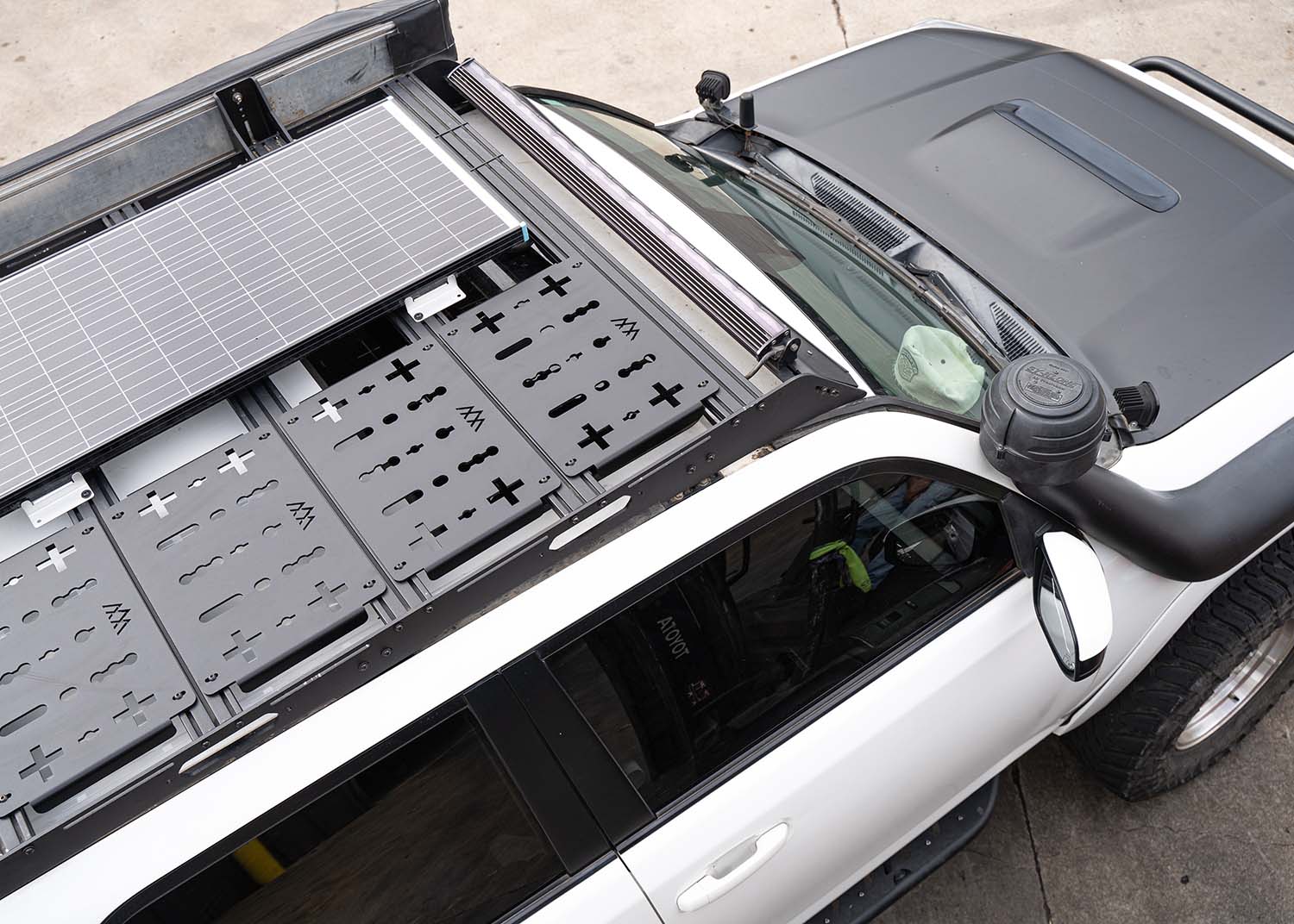 Top of the Backwoods Adventure Mods Toyota 2010-2024 5th Gen 4Runner DRIFTR Roof Rack with accessories and solar panel mounted