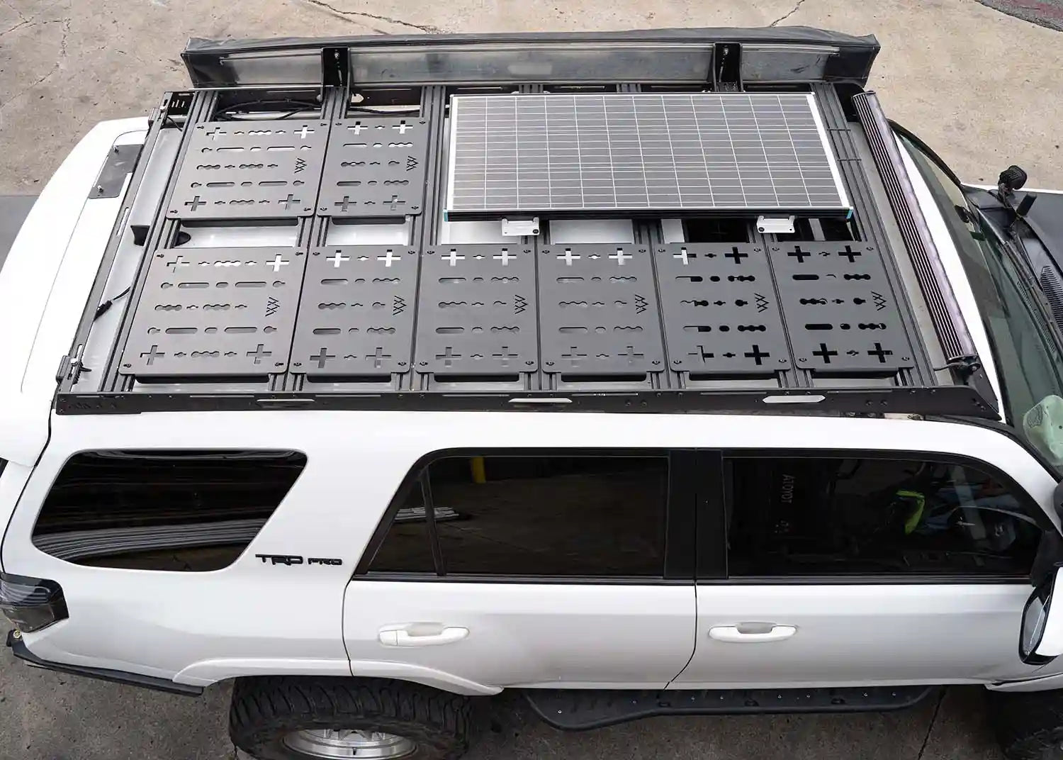 Image showing modular Deck Panel accessory layout installed on Backwoods Adventure Mods 5th Gen Toyota 4Runner DRIFTR Roof Rack