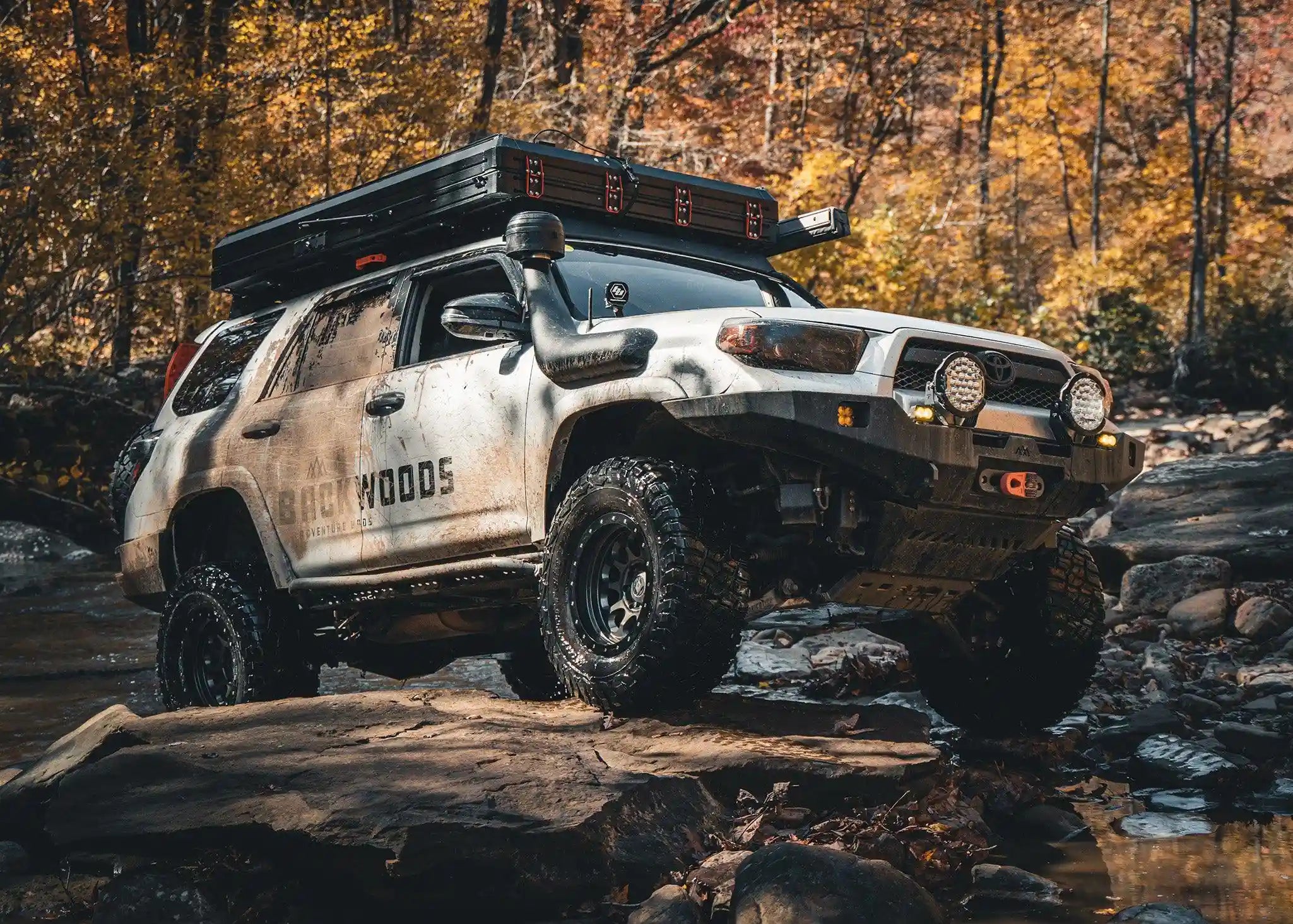 Rock crawling off road with the Backwoods Adventure Mods 2014-2022 5th Gen Toyota 4Runner Hi-Lite Overland Front Winch Bumper installed