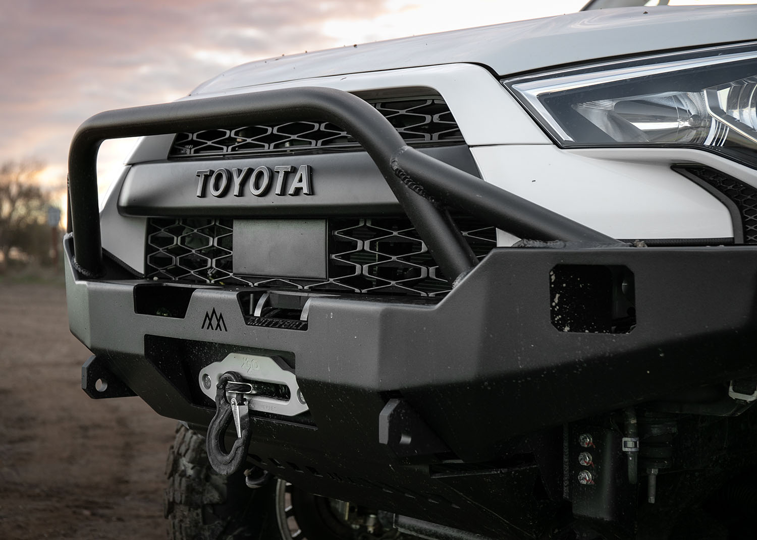 Close up of the Prerunner Bull Bar on the Backwoods Adventure Mods Hi-Lite Overland Hybrid off road 5th Gen Toyota 4Runner Front Bumper