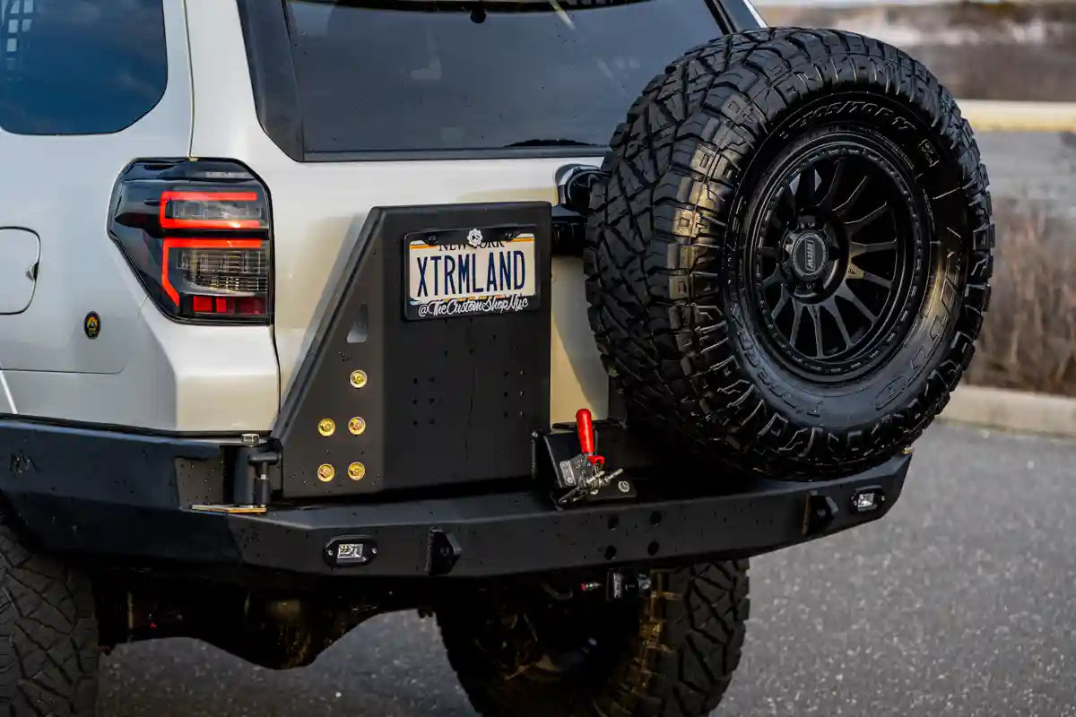 Rear facing image of the Backwoods Adventure Mods 5th Gen Toyota 4Runner (2014-2022) Hi-Lite High Clearance Dual Swing Out Rear Bumper with swing outs closed